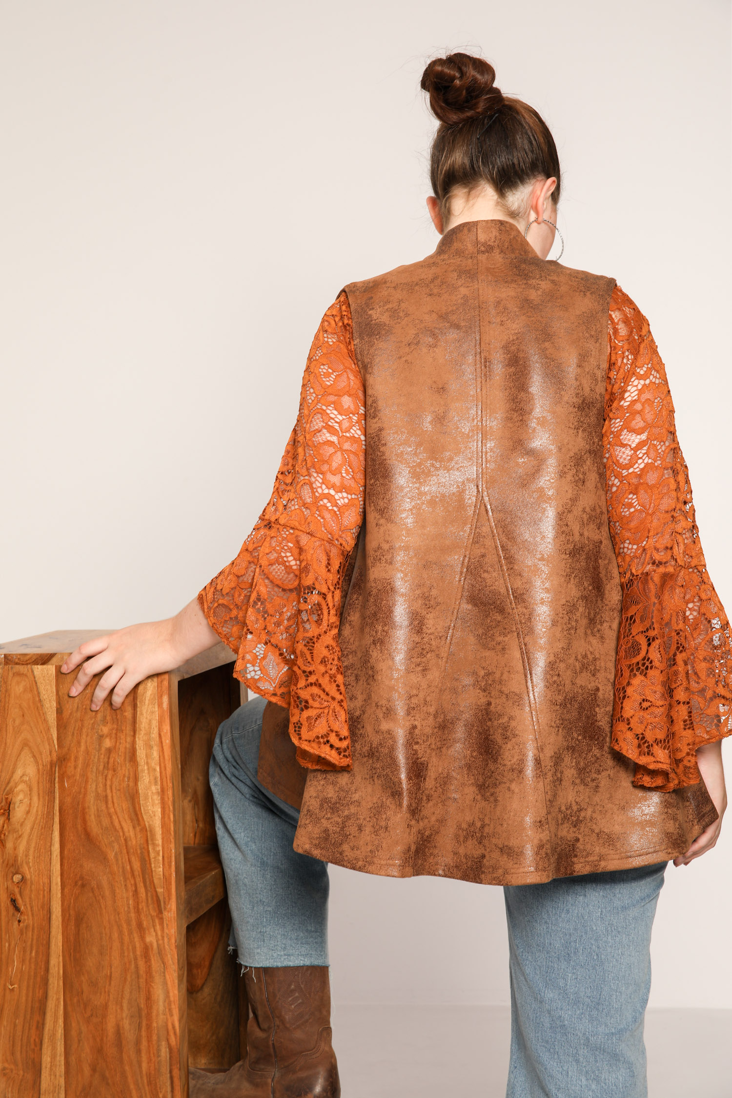Sleeveless vegan leather jacket