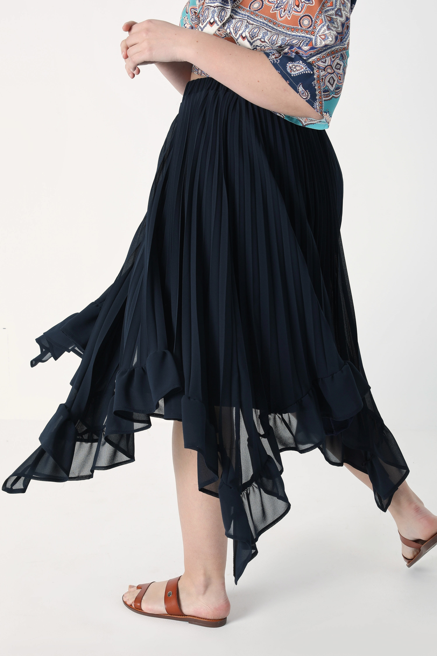 Pleated voile skirt with flounce.