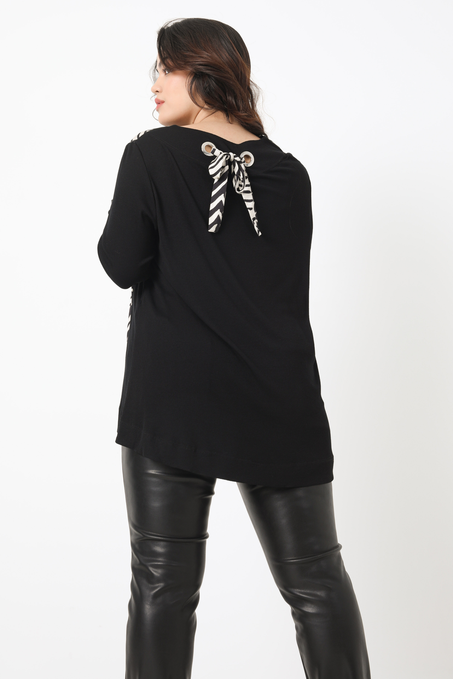 Bi-material t-shirt with large decorative eyelet
