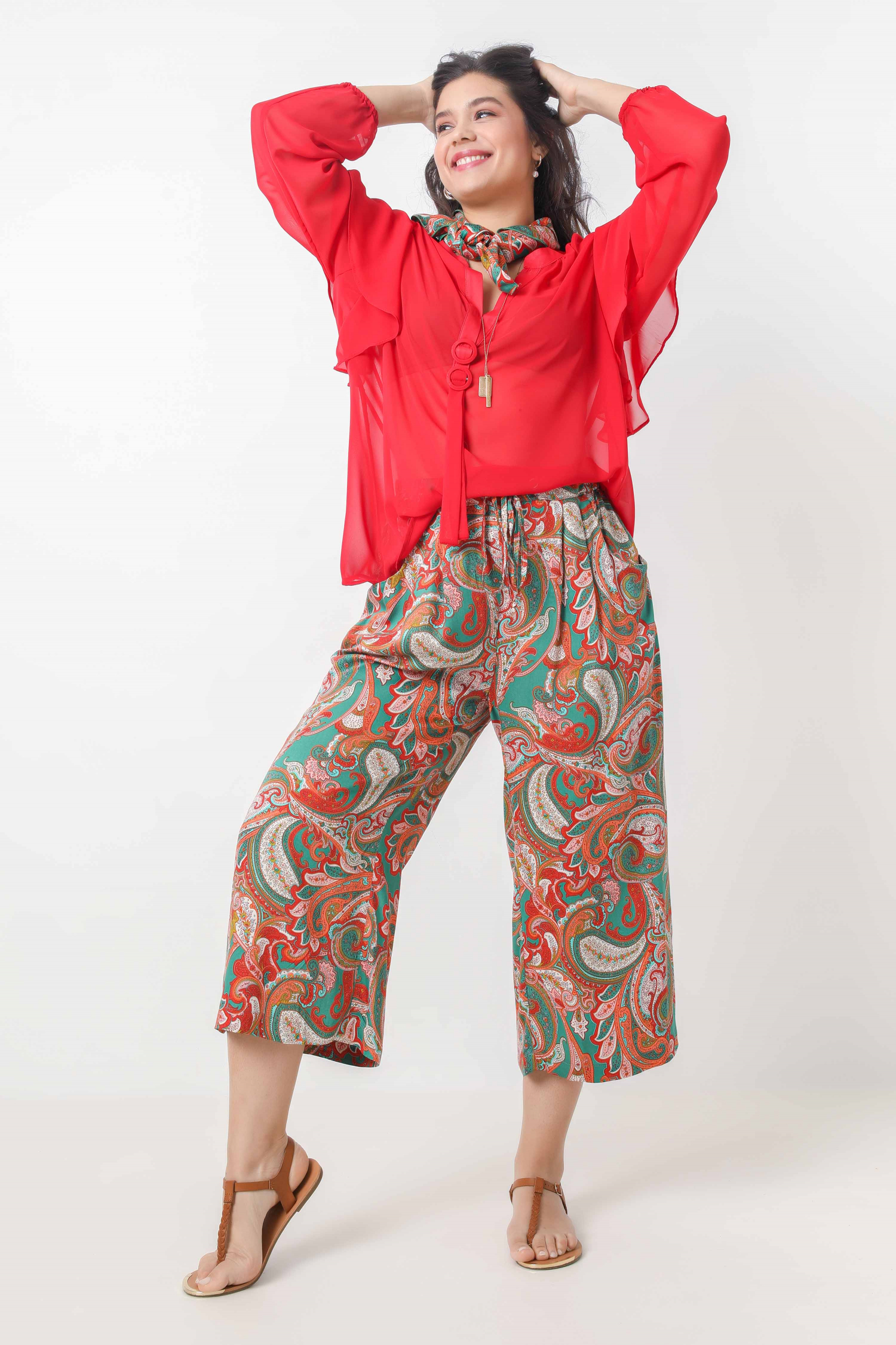 Blouse en voile uni avec anneaux ton/ton