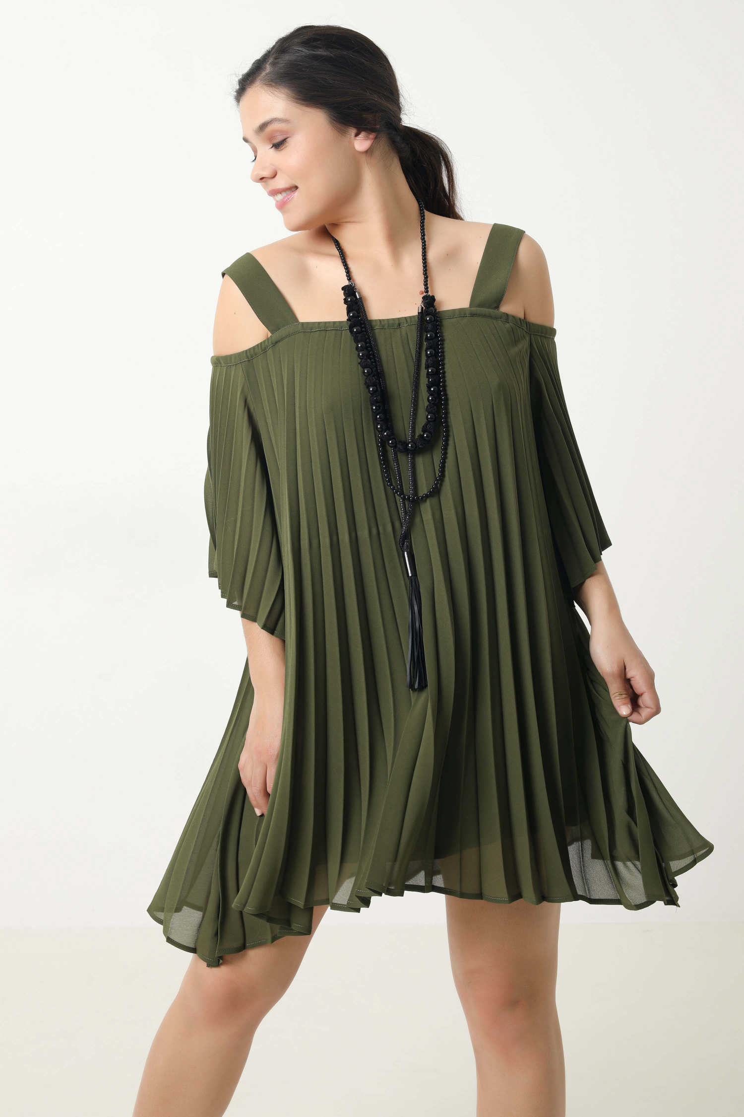 Short pleated tunic with straps in plain color