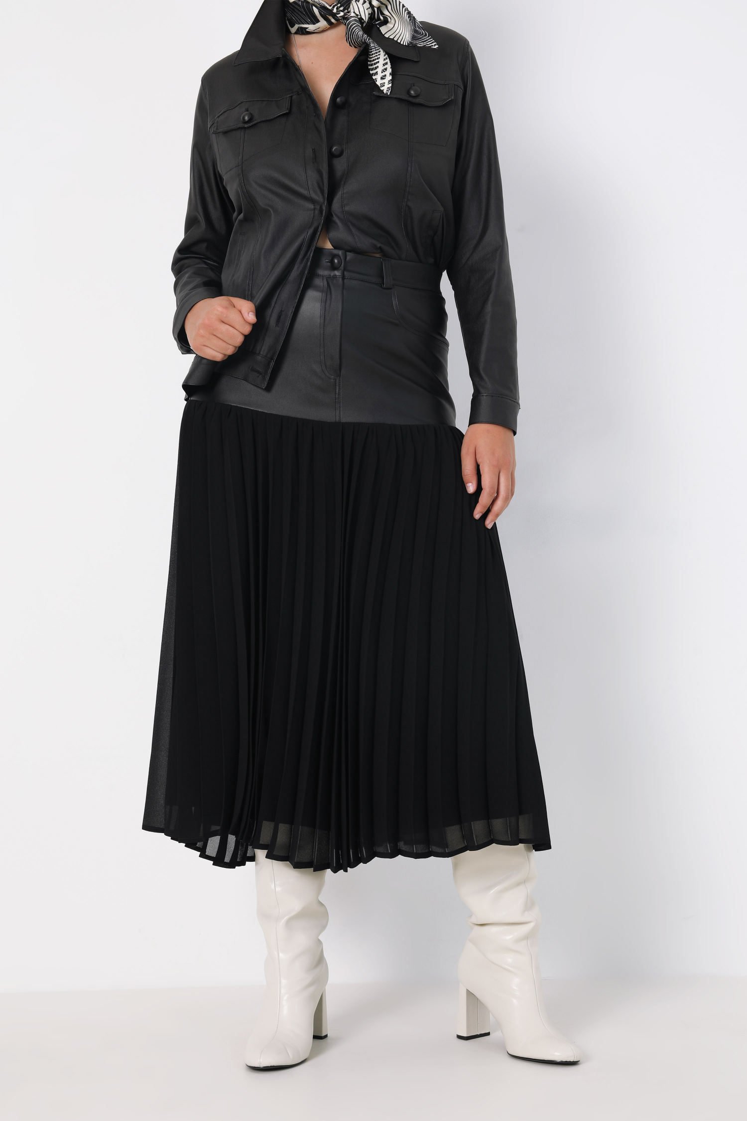 Pleated skirt with faux leather peplum