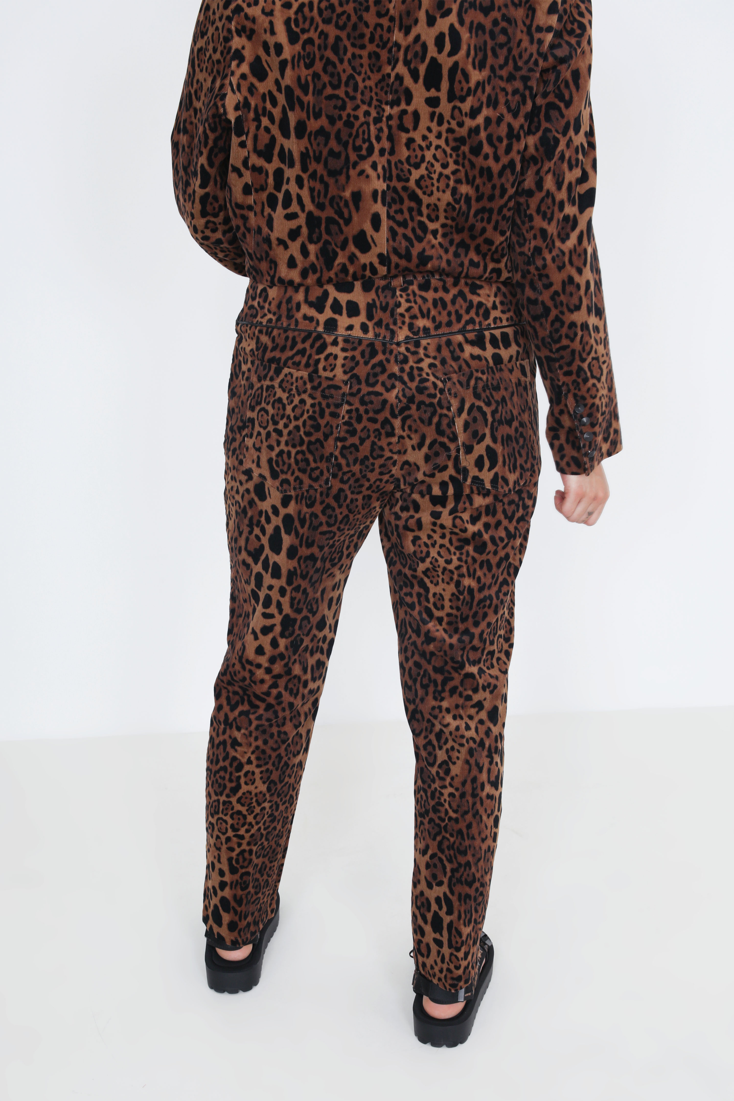 Panther print corduroy trousers