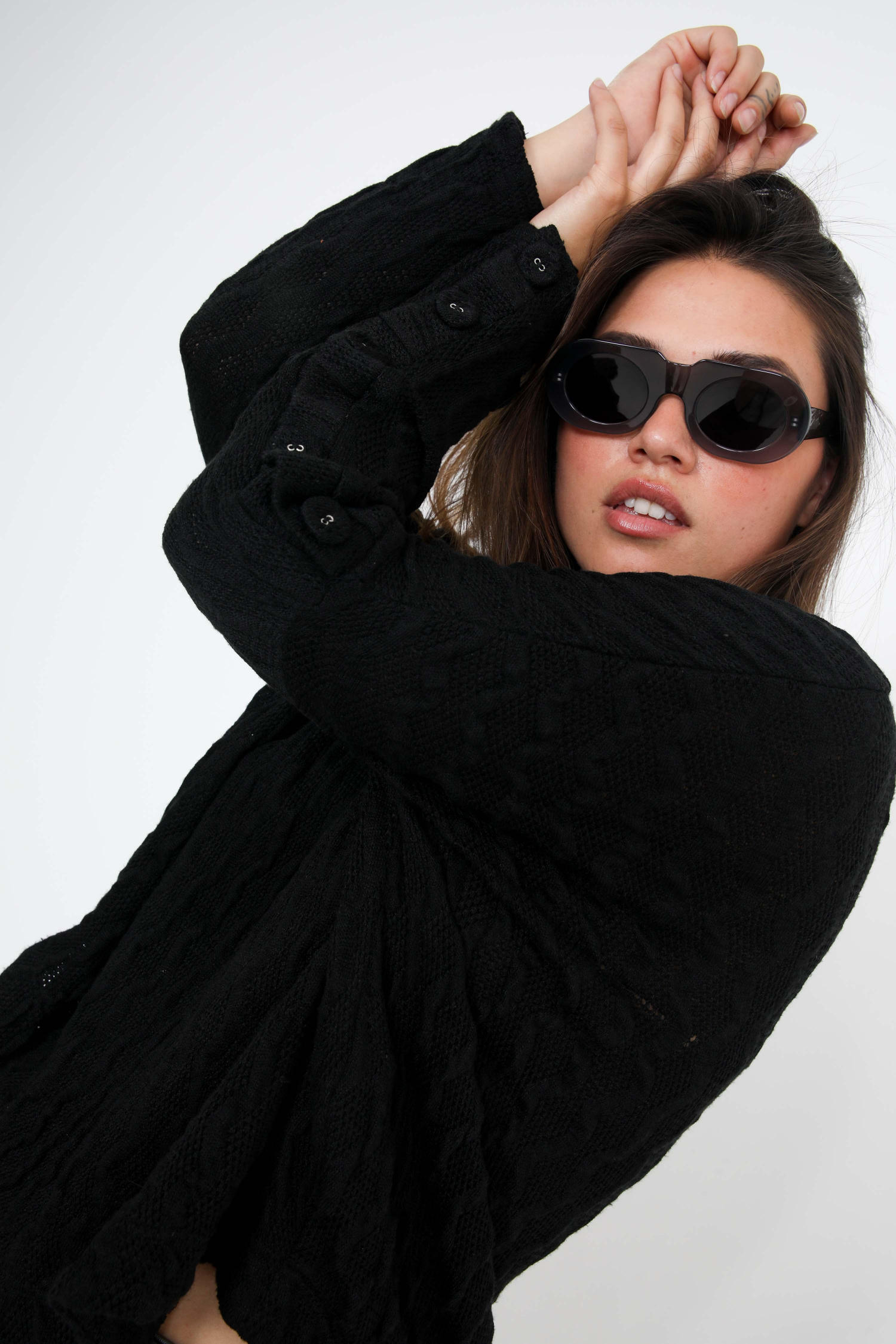 Pull en maille torsade uni avec boutons