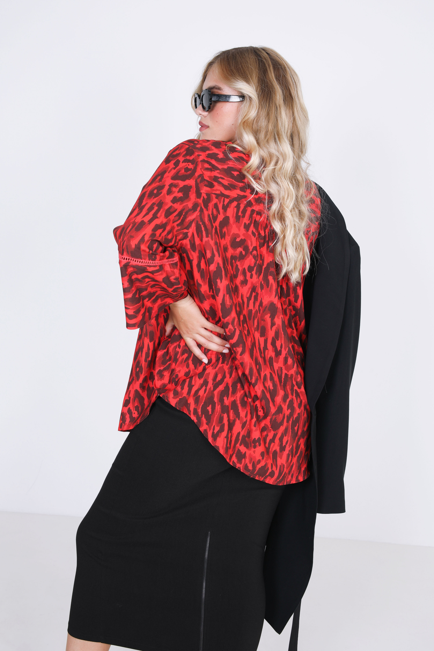 Printed blouse with braid on the sleeves