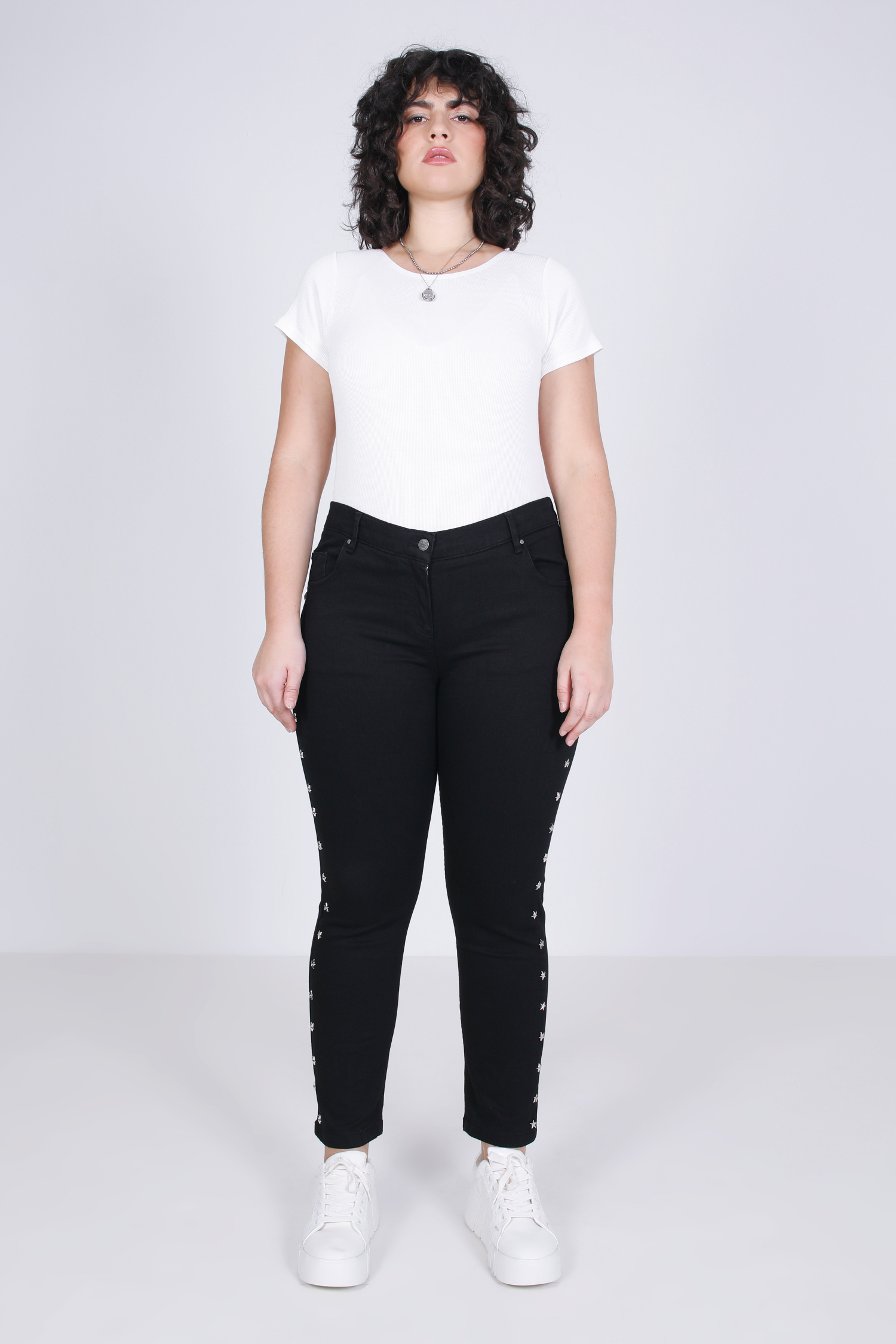 Black jeans with star-shaped studs