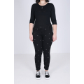 Black jeans with studs on the front