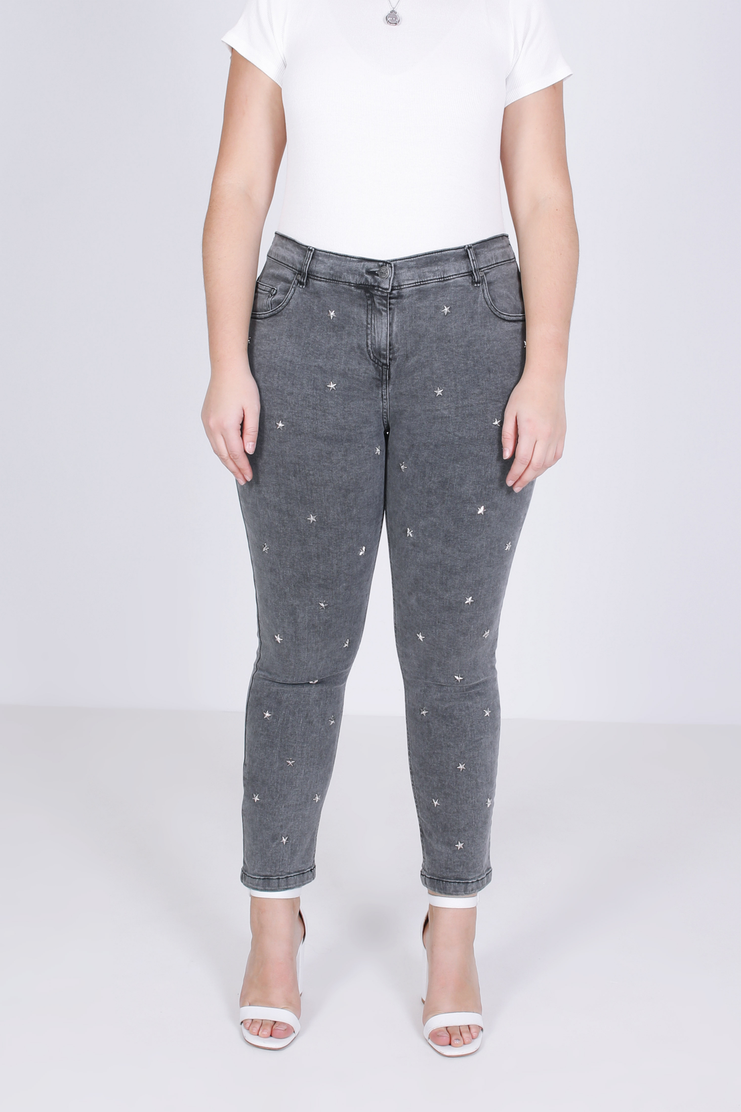 Gray jeans with studs on the front