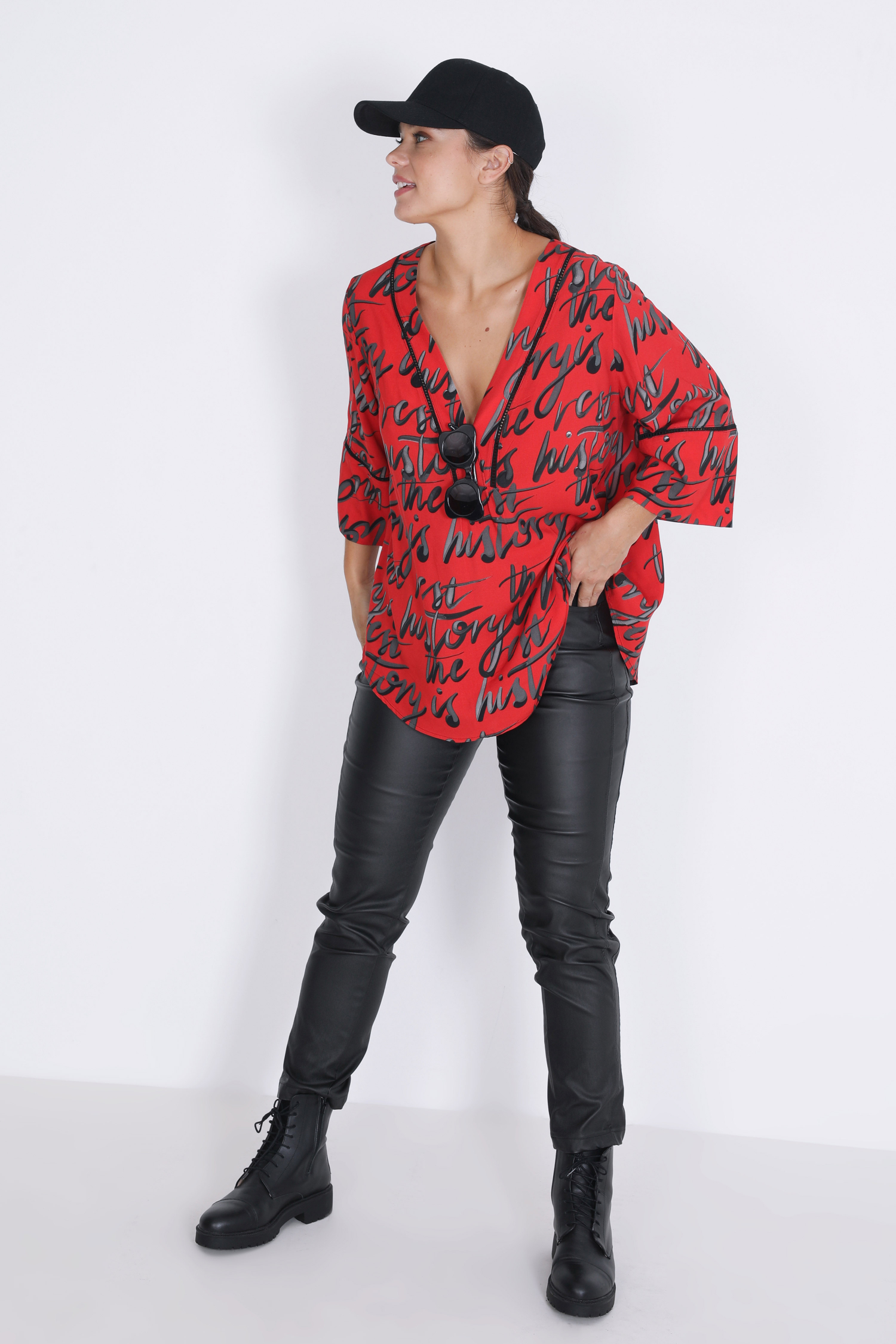 Printed blouse with braid on the sleeves