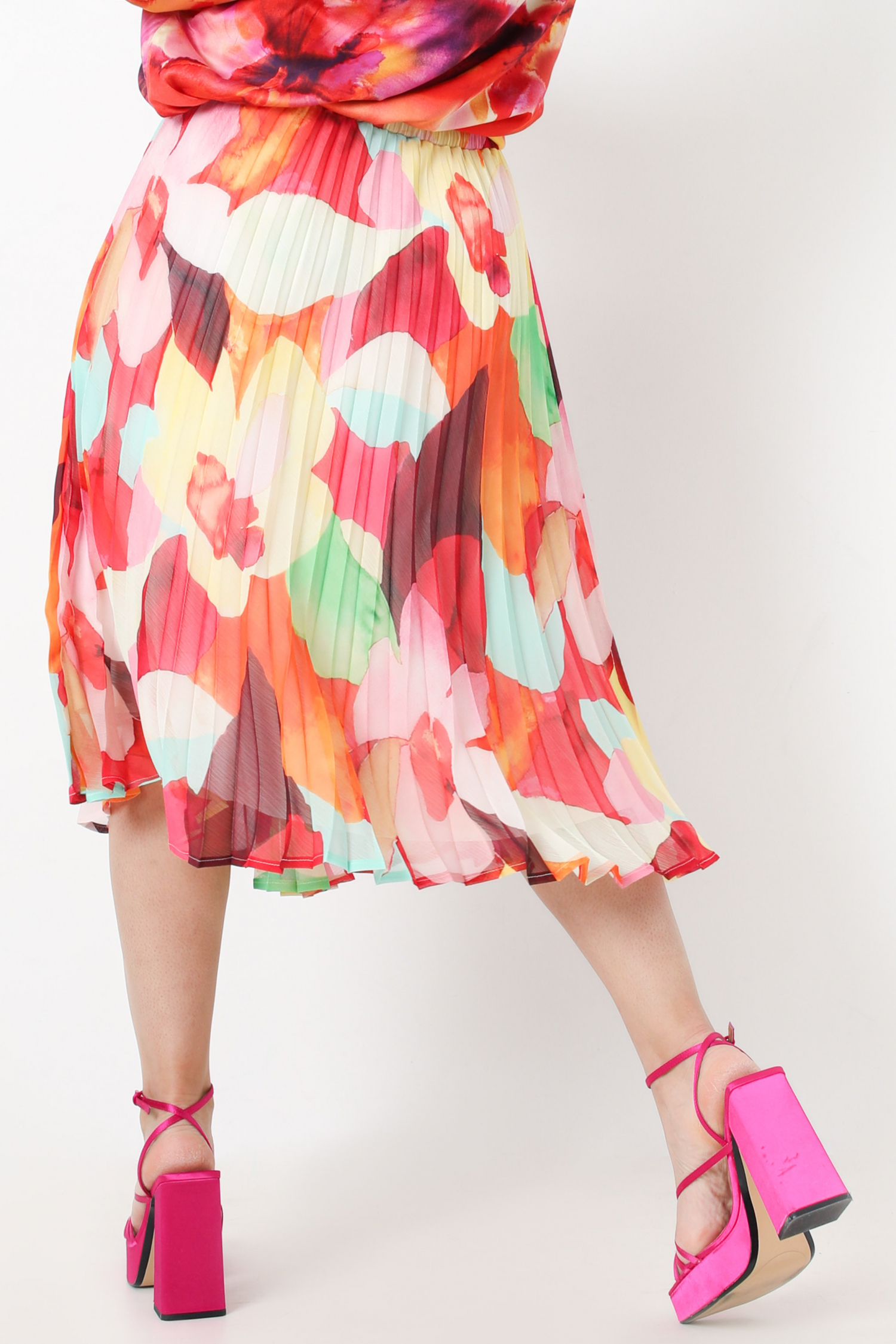 Pleated skirt in eco-responsible printed voile (expedition May 10/15)