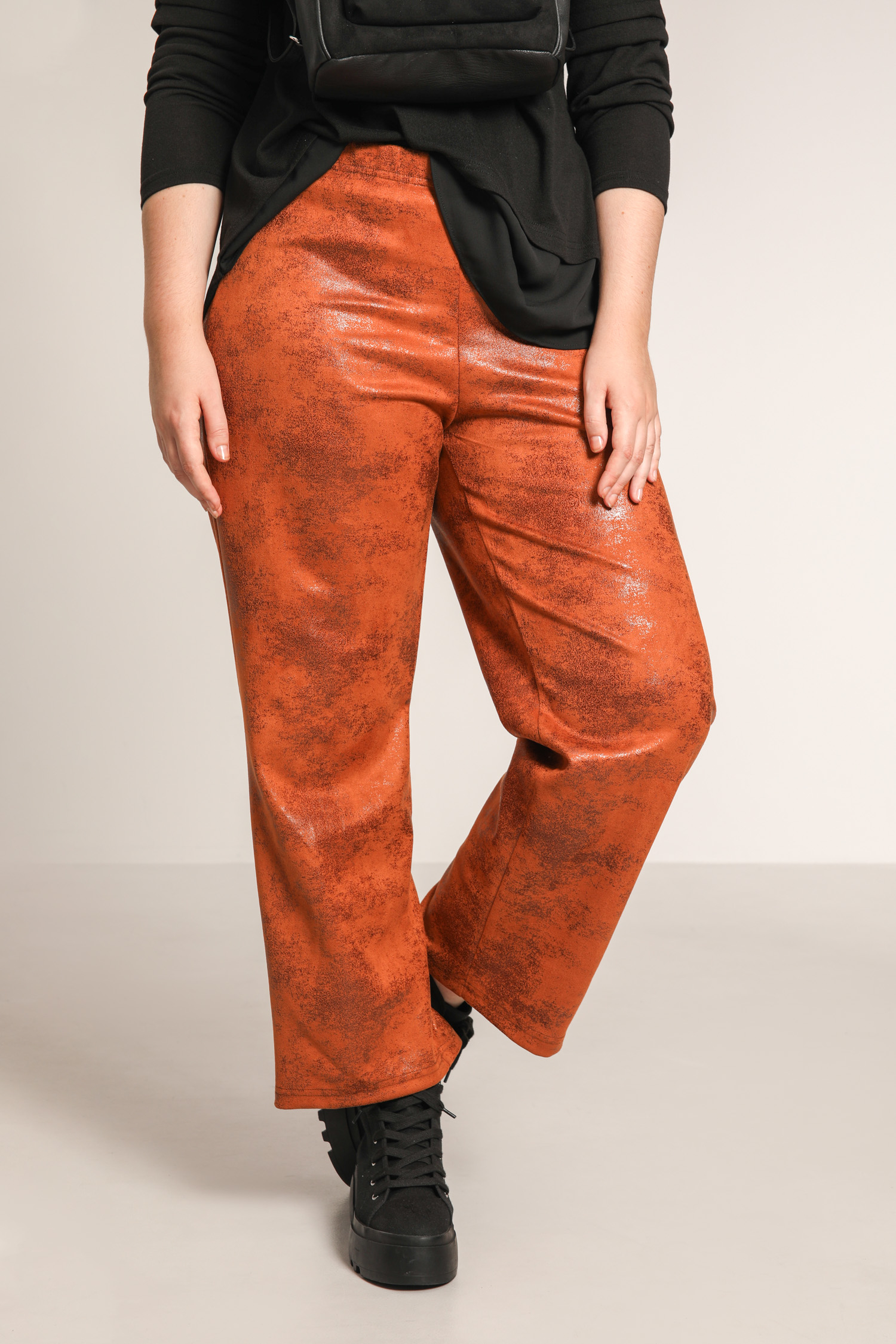 Distressed vegan leather pants