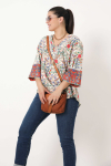 Printed blouse with braid on the sleeves