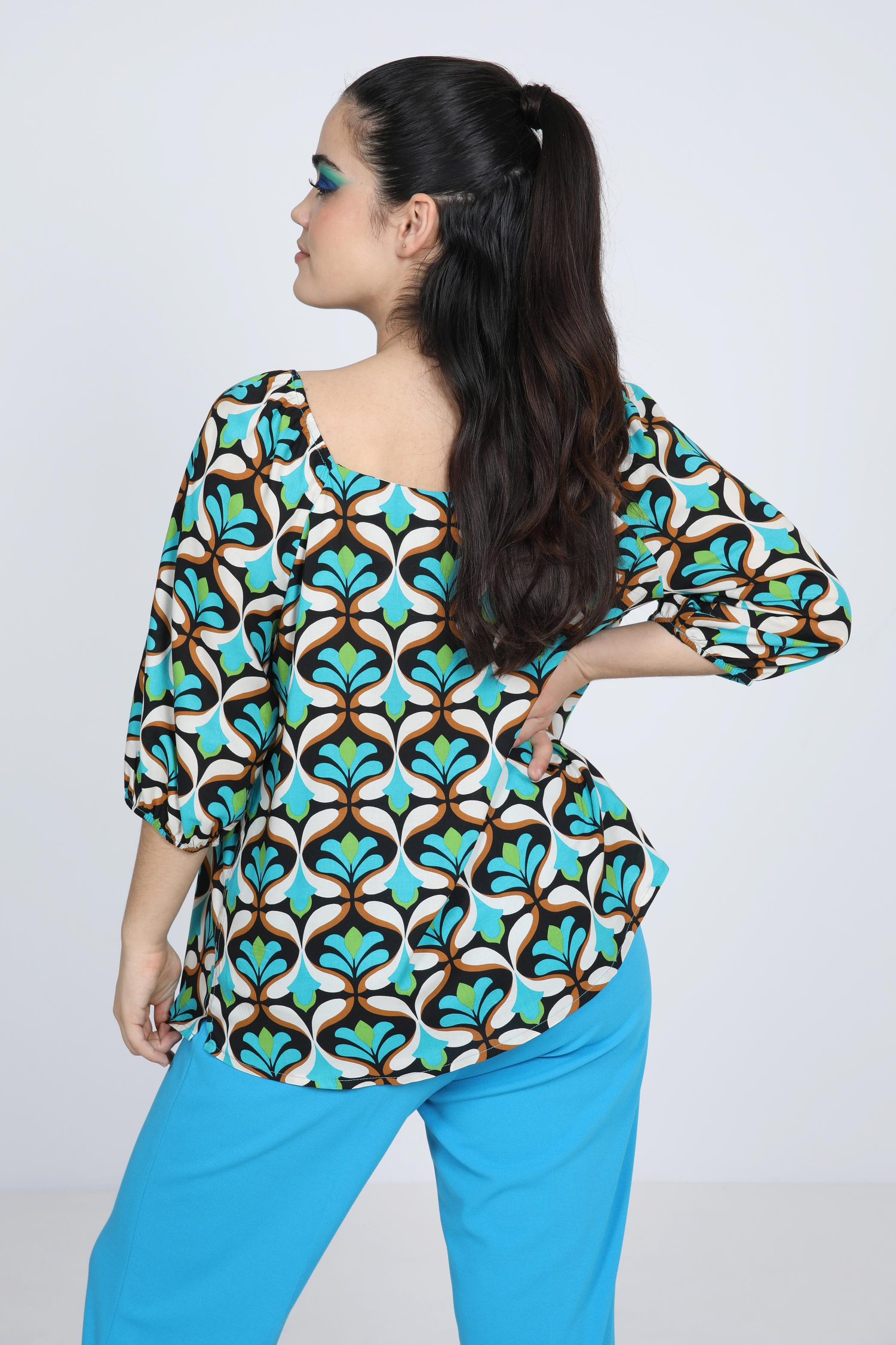 Printed blouse with cascading ruffles