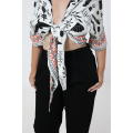 Short bolero in printed design based on