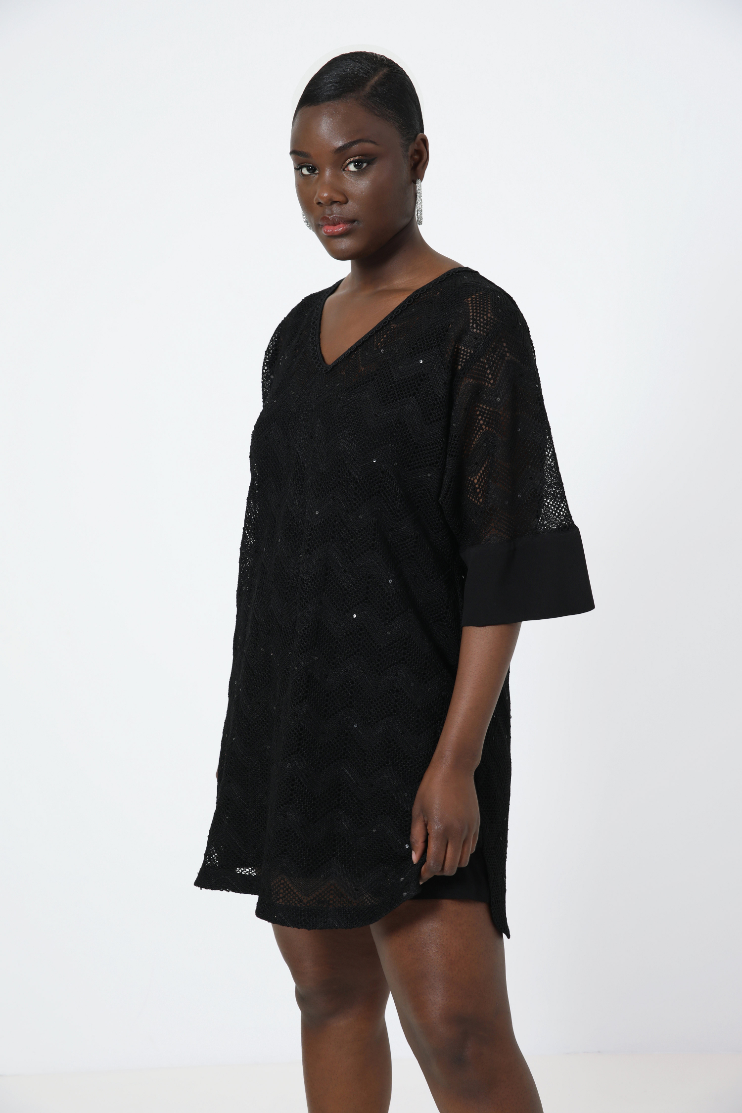 Plain openwork knit tunic with knit top