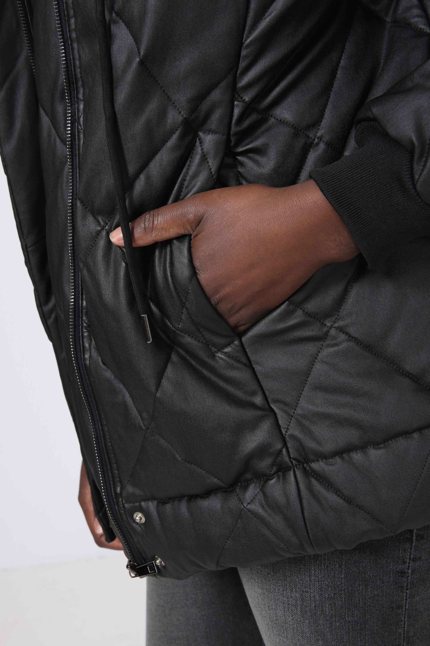 Quilted down jacket in faux leather