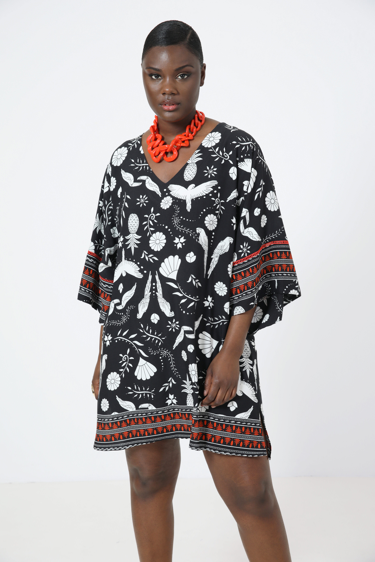 Printed tunic with a design based on