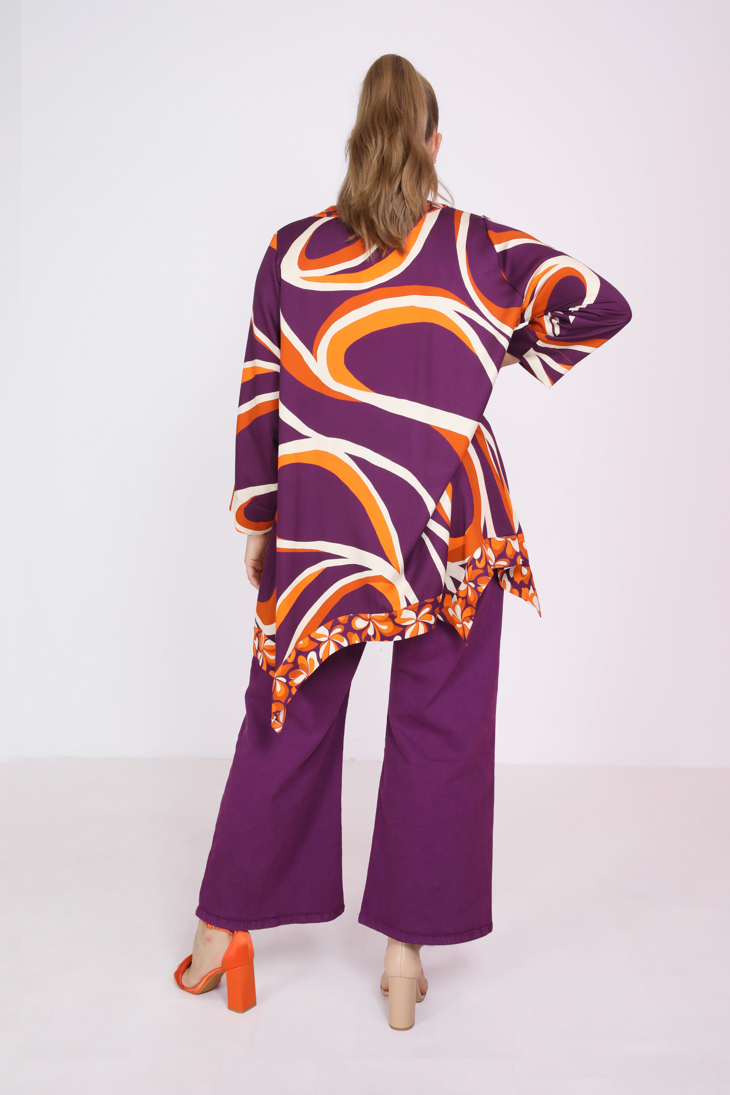 Long tunic with graphic and floral bi-print
