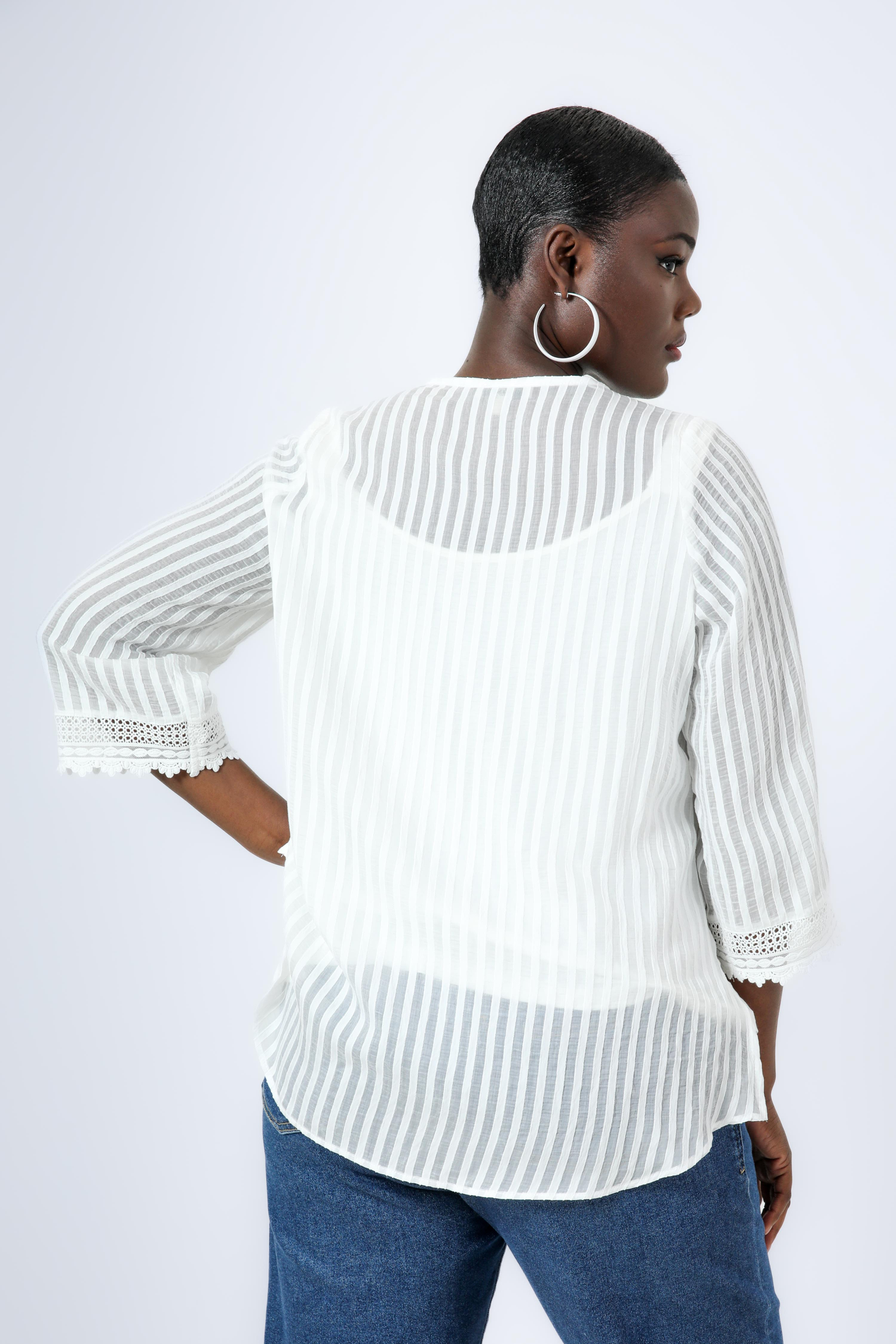 Blouse en voile gaufré effet rayure ton/ton