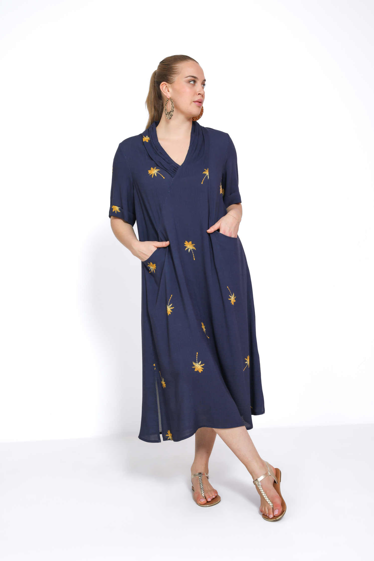 Long plain dress with gold palm tree pattern