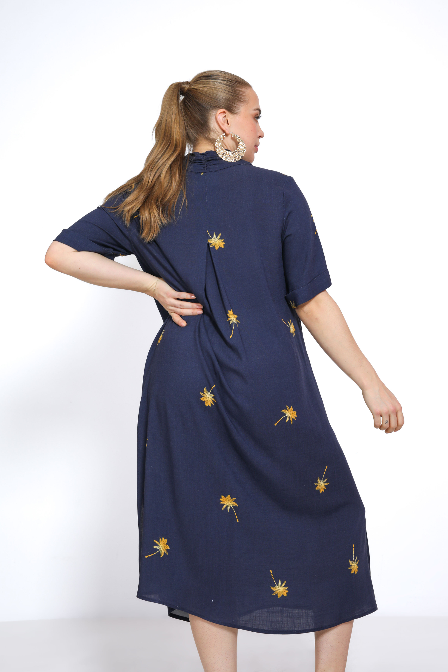 Long plain dress with gold palm tree pattern