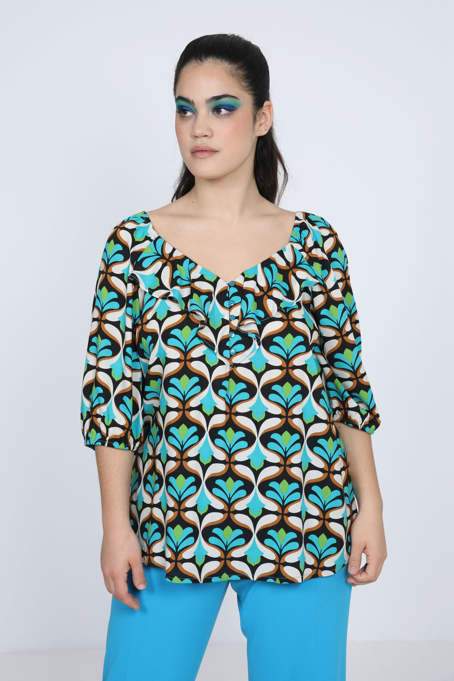 Printed blouse with cascading ruffles