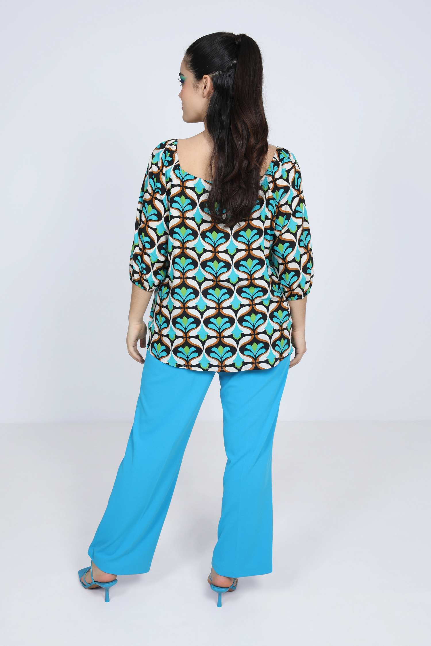 Printed blouse with cascading ruffles