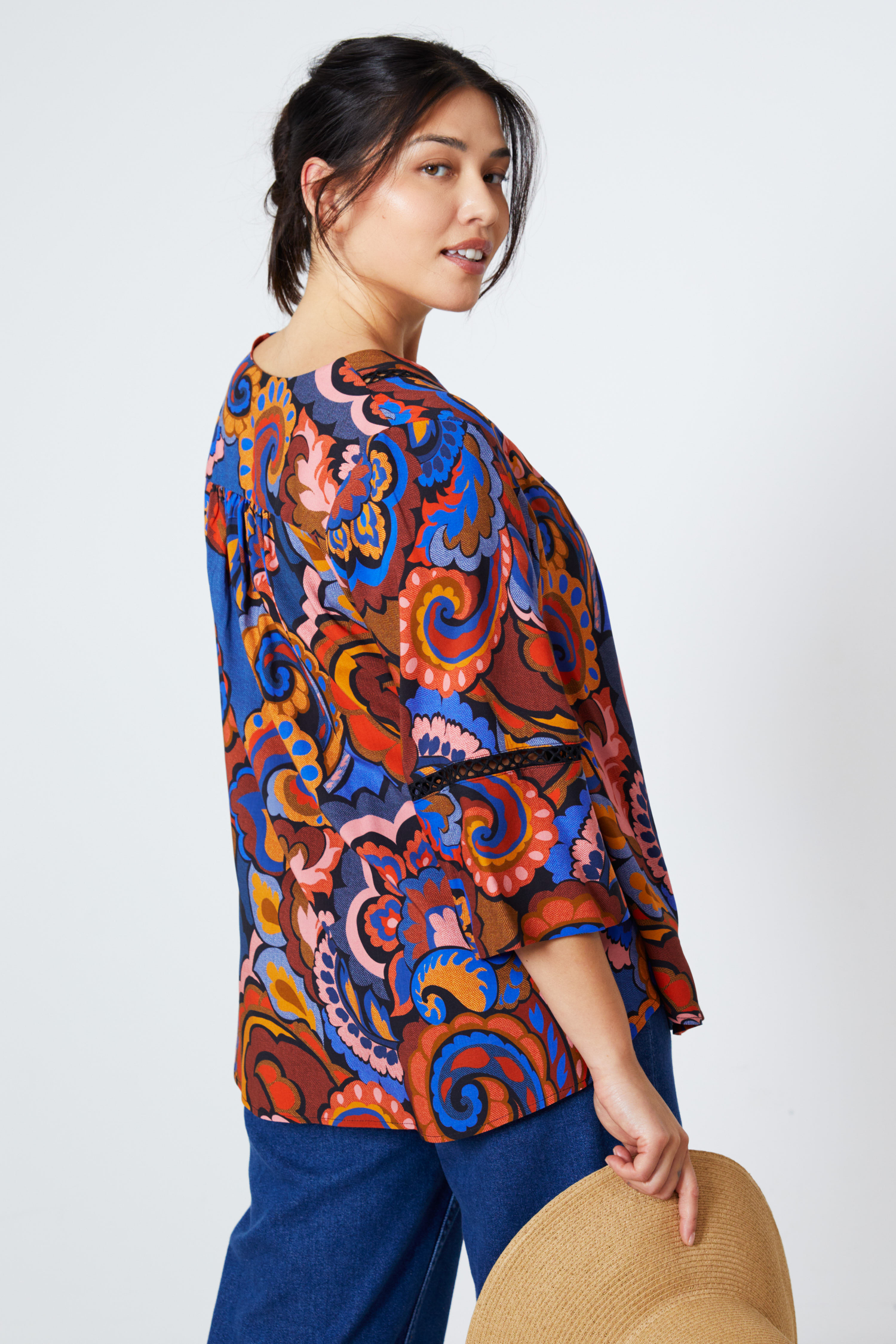 Blouse en imprimé avec galon aux manches