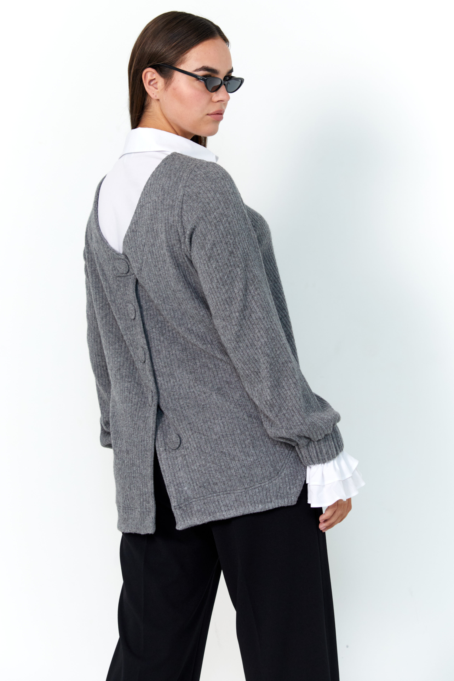 Chic sweater with poplin shirt effect underneath.