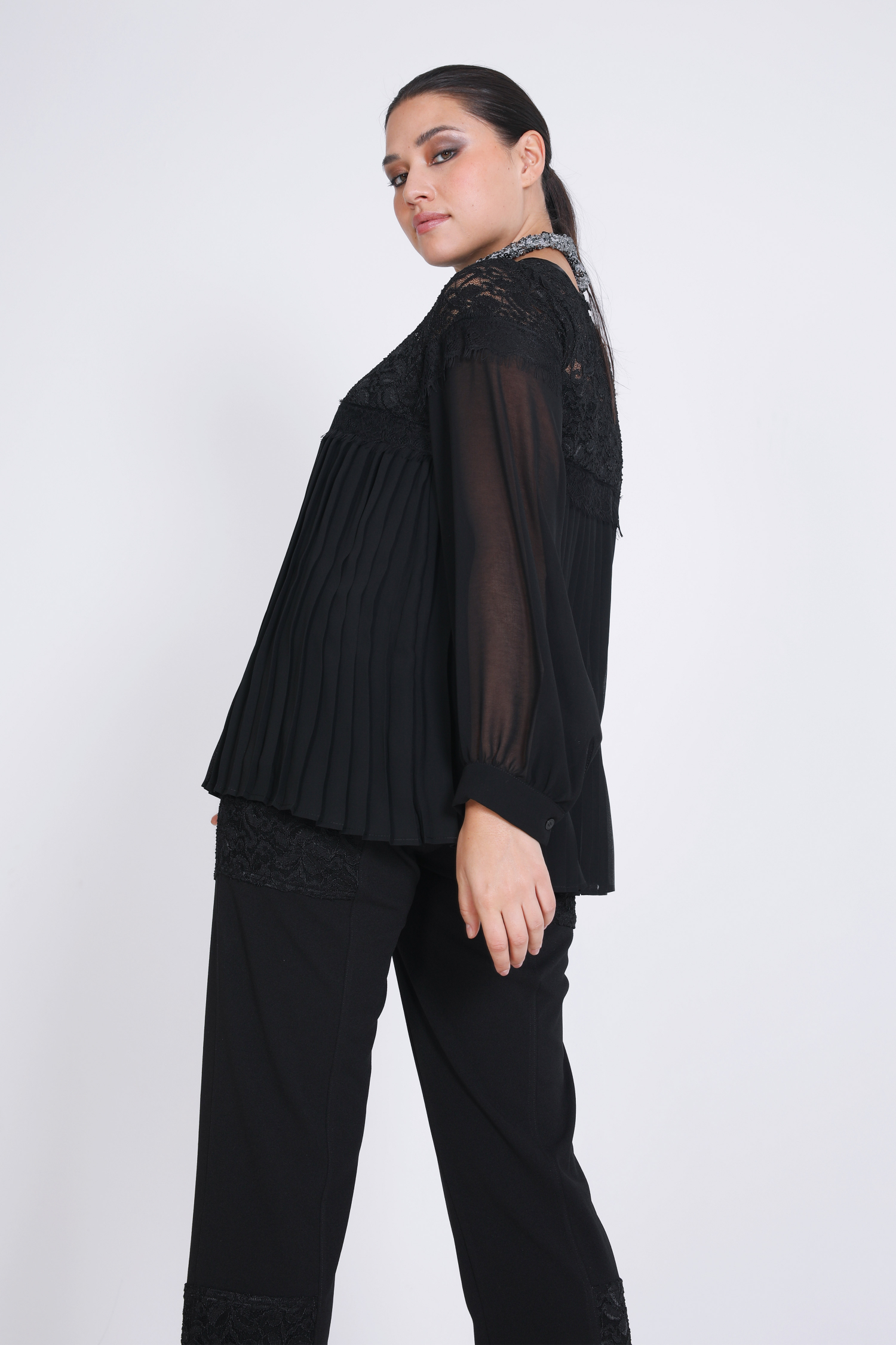 Pleated veil and lace blouse