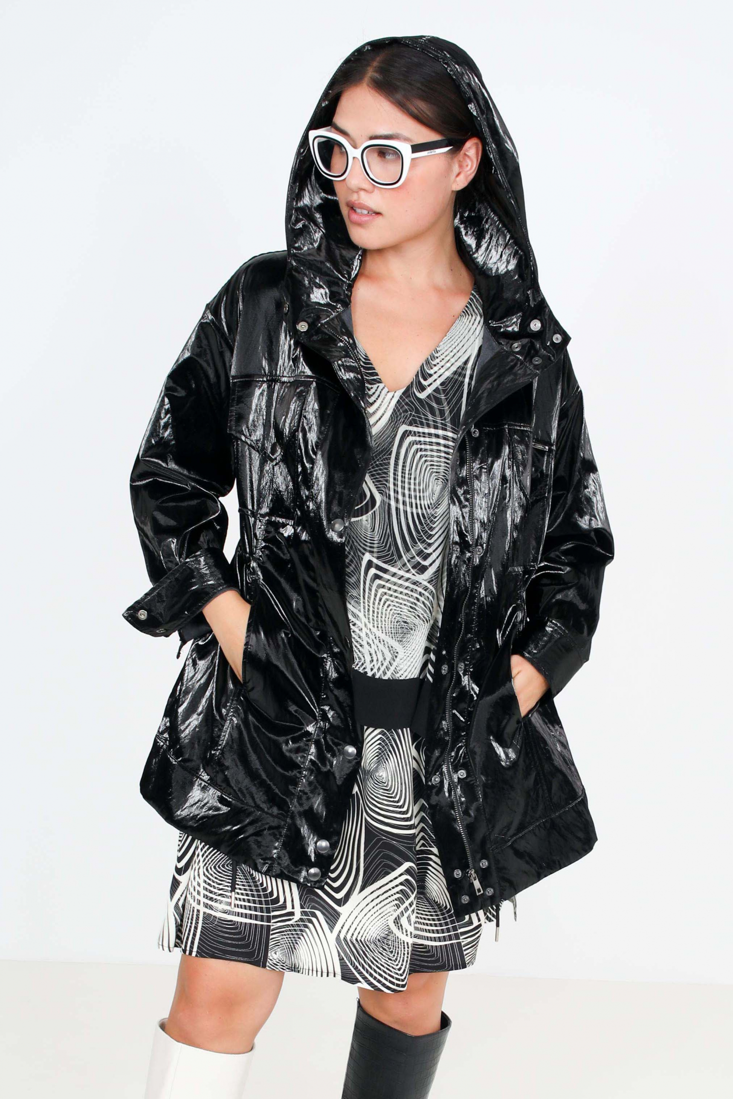 Waterproof black vinyl parka with hood.