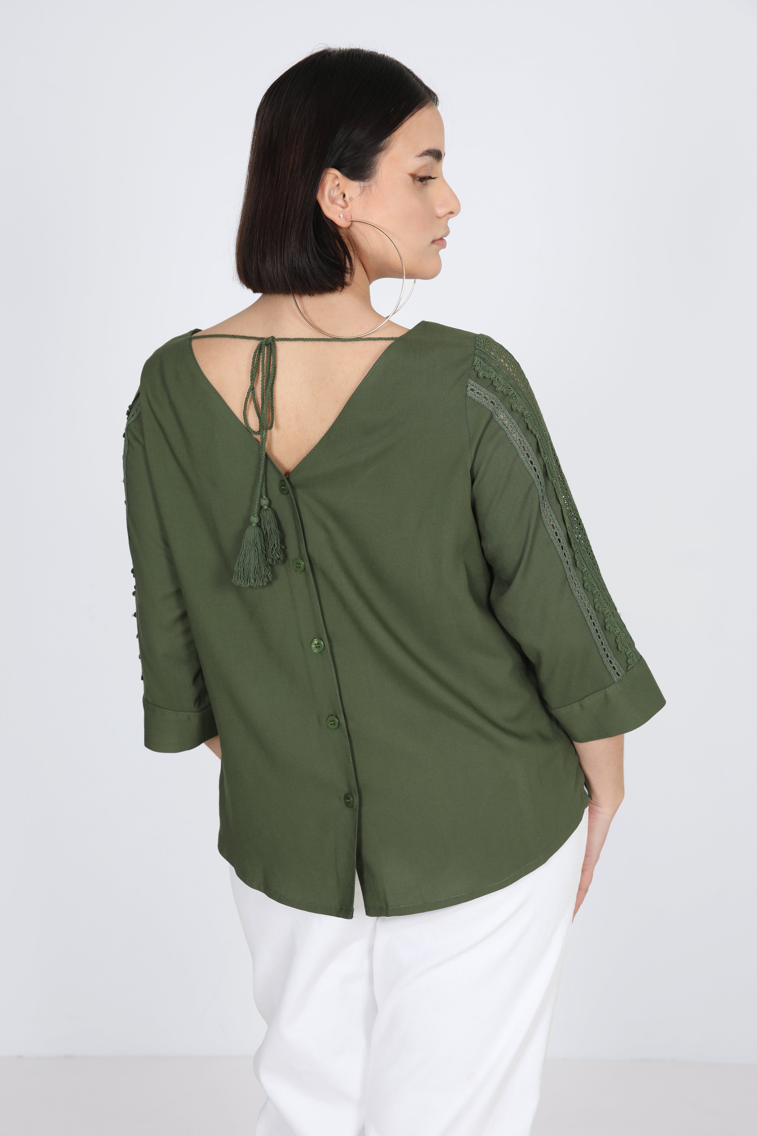 plain blouse buttoned on the back