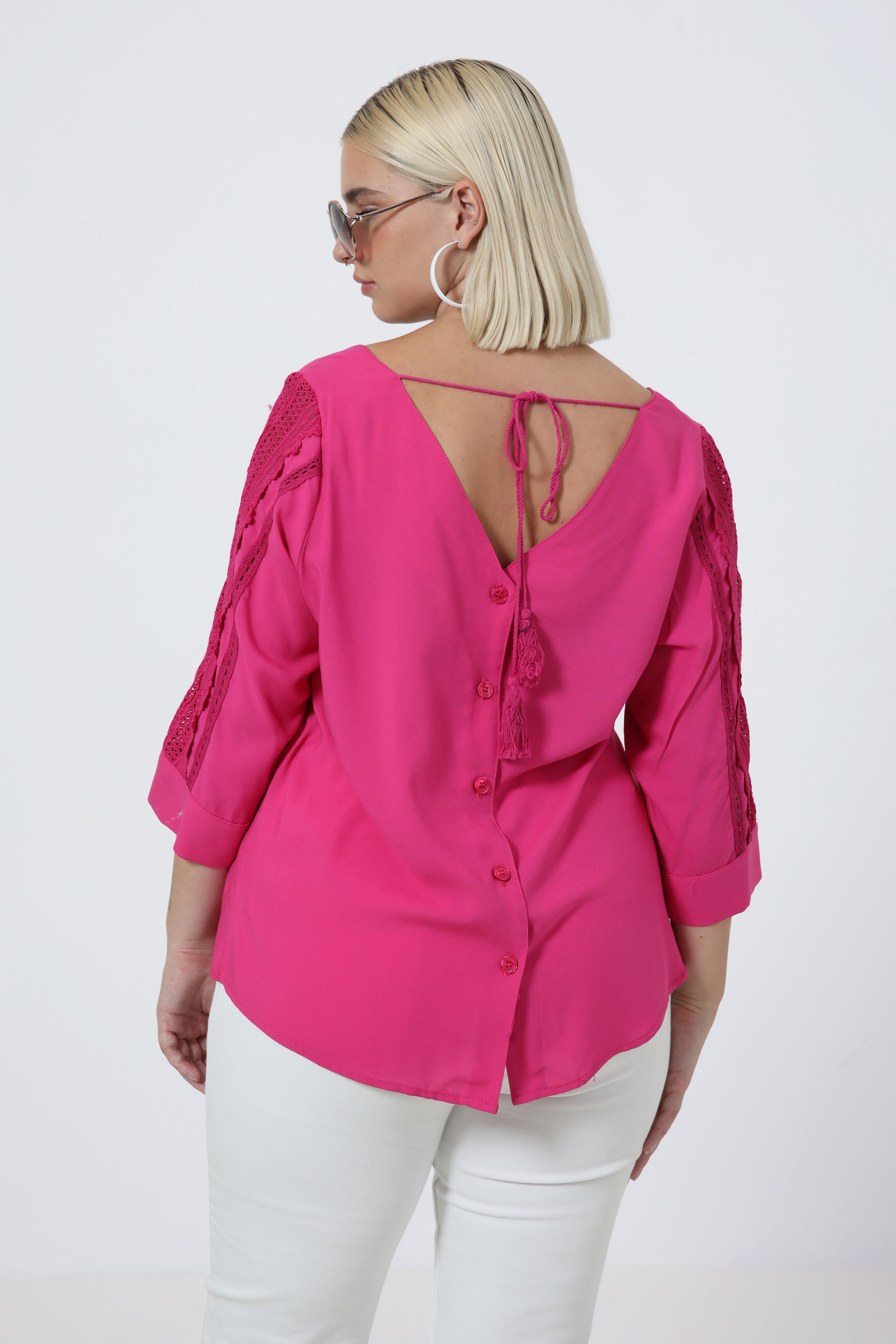 plain blouse buttoned on the back