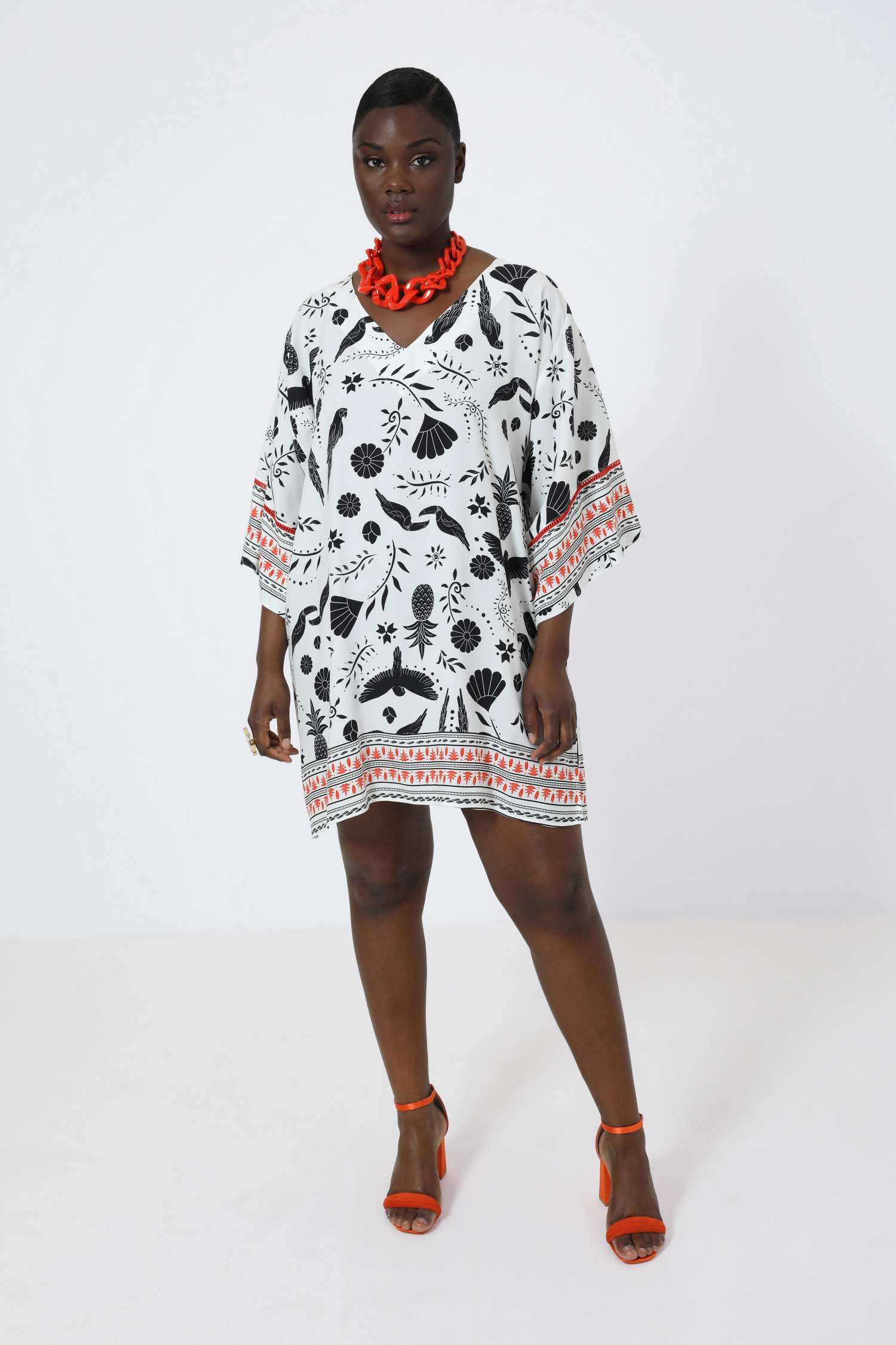 Printed tunic with a design based on