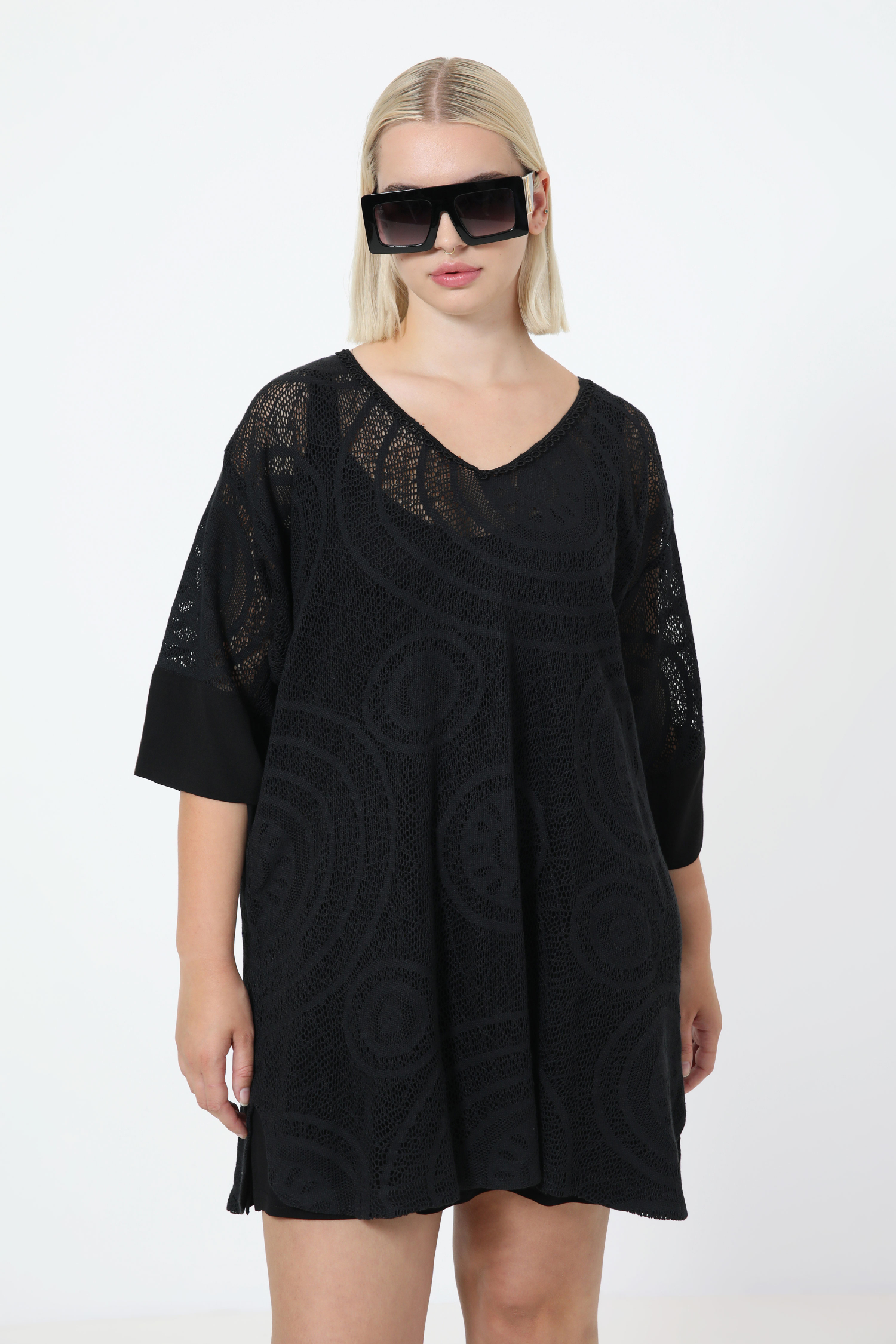 Plain openwork knit tunic with knit top