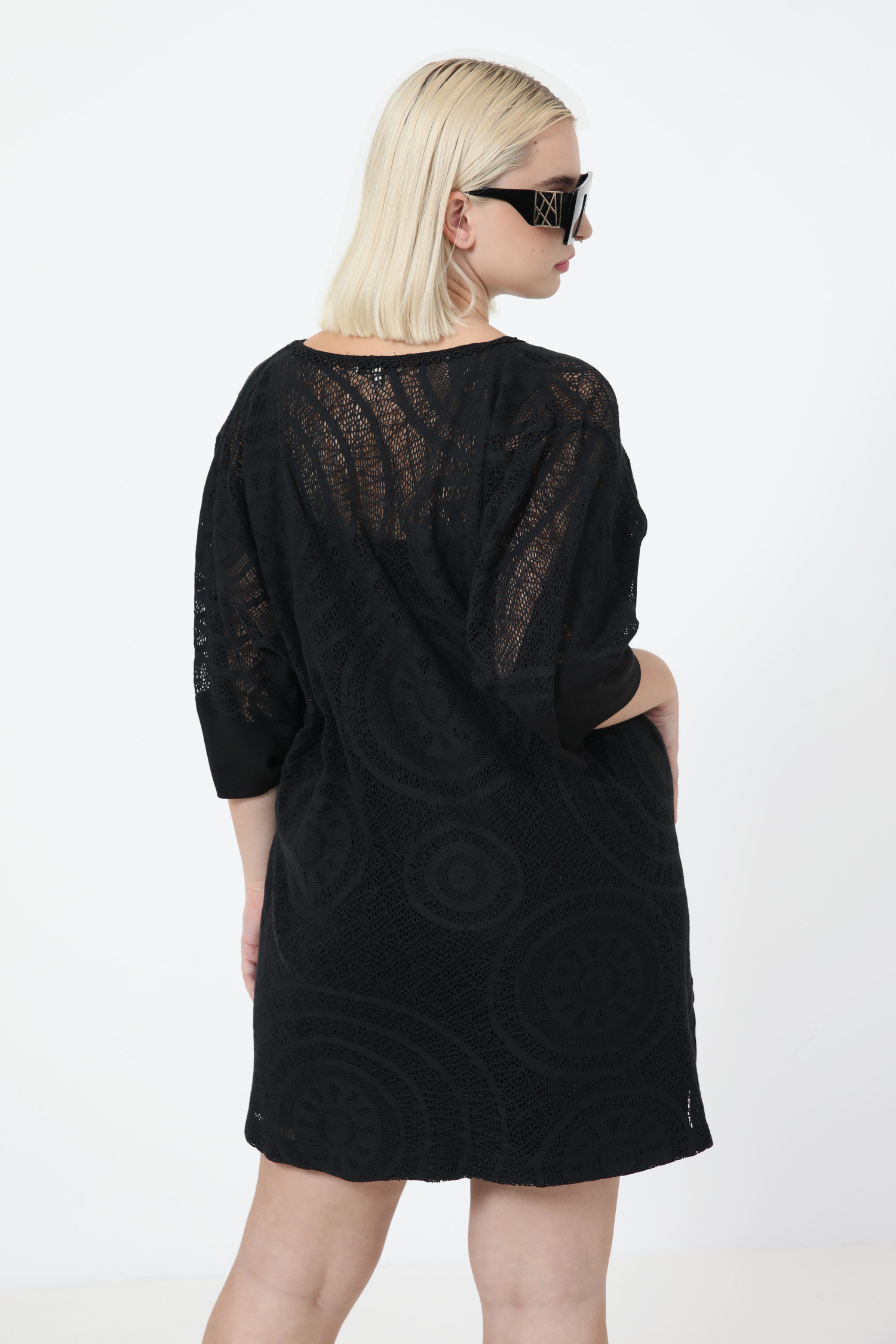 Plain openwork knit tunic with knit top