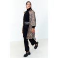 Long shirt with animal print and suede effect.