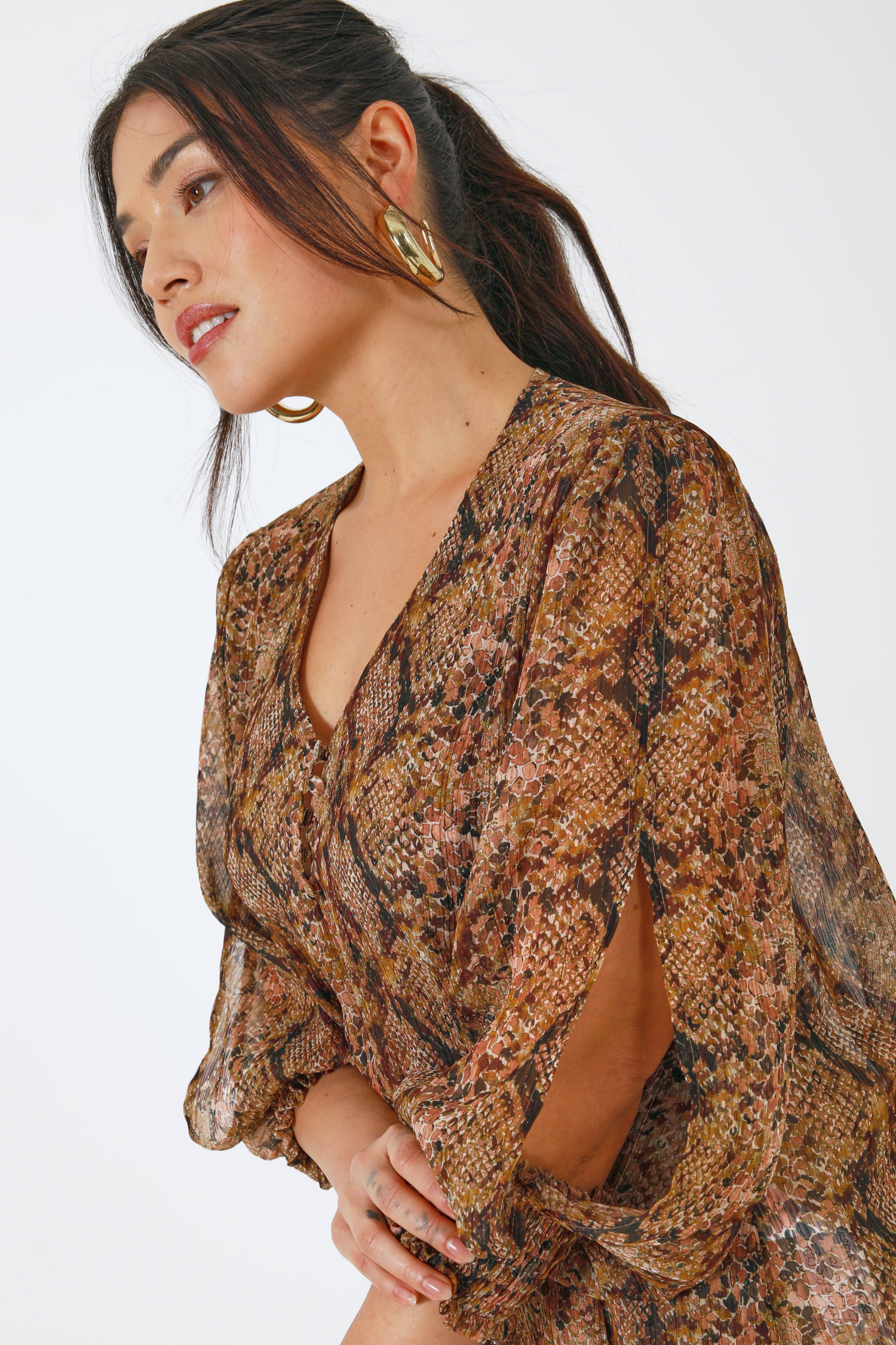 Snake print voile blouse.