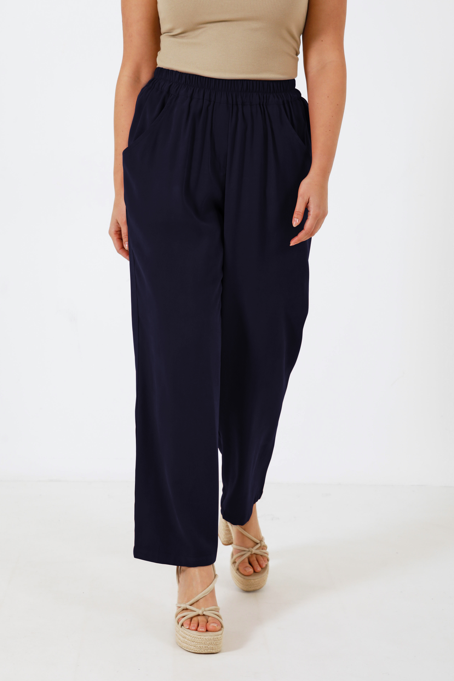 Plain tailored trousers with elasticated waist