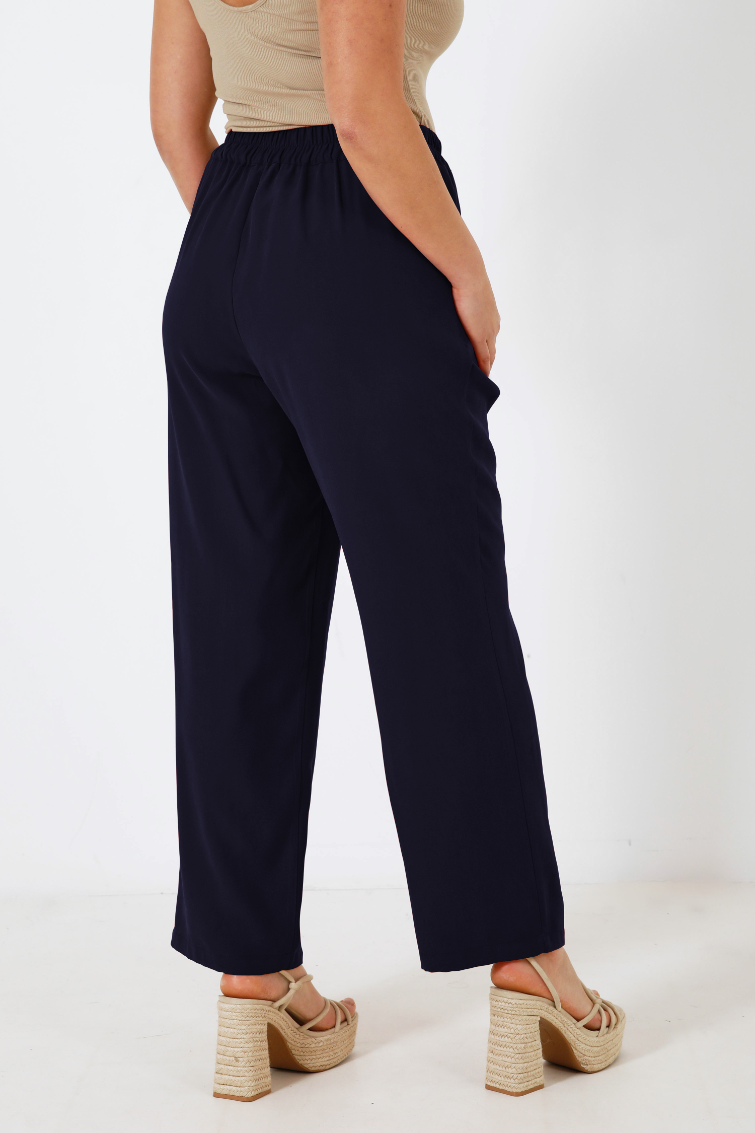 Plain tailored trousers with elasticated waist