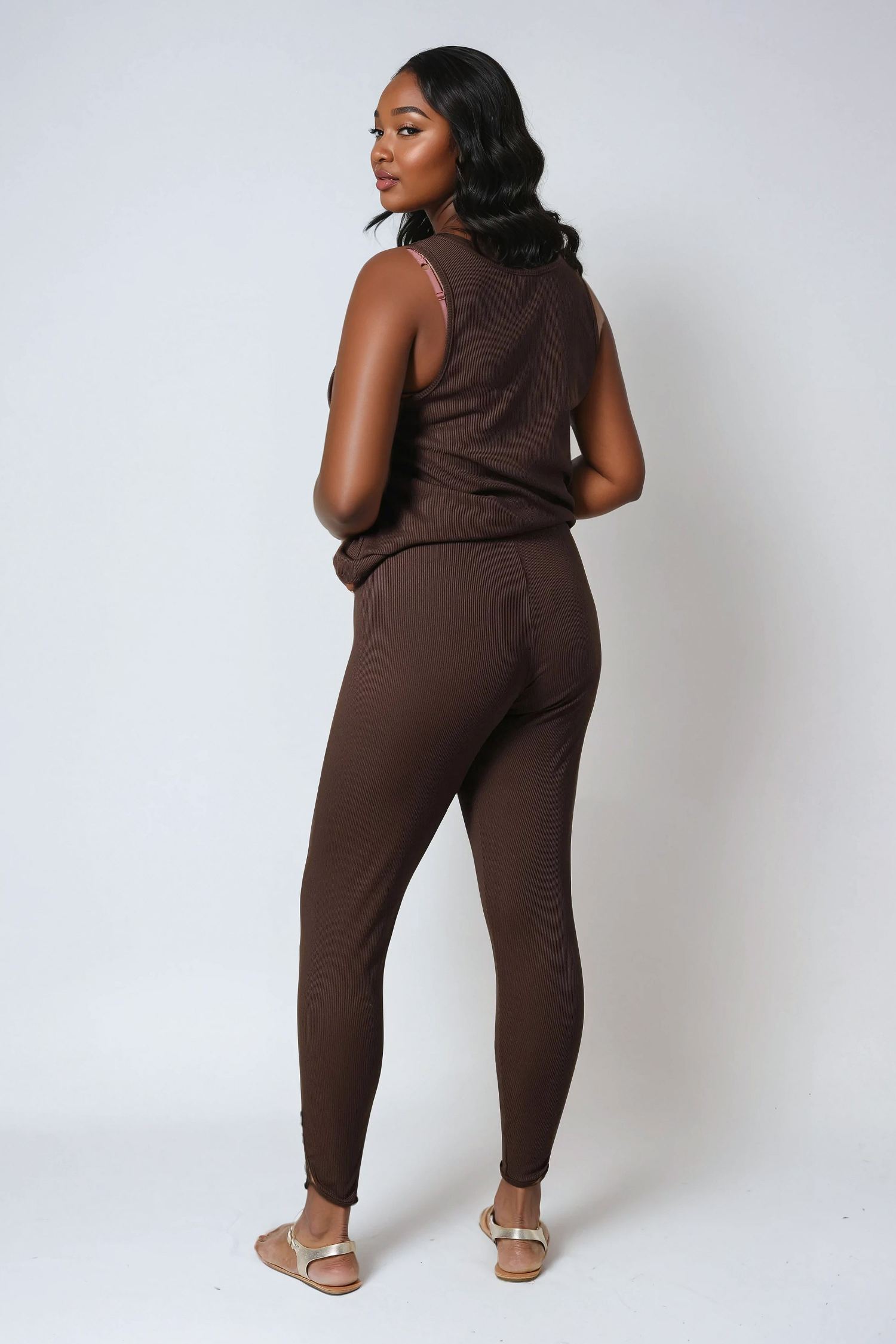 Plain knit leggings with row of buttons