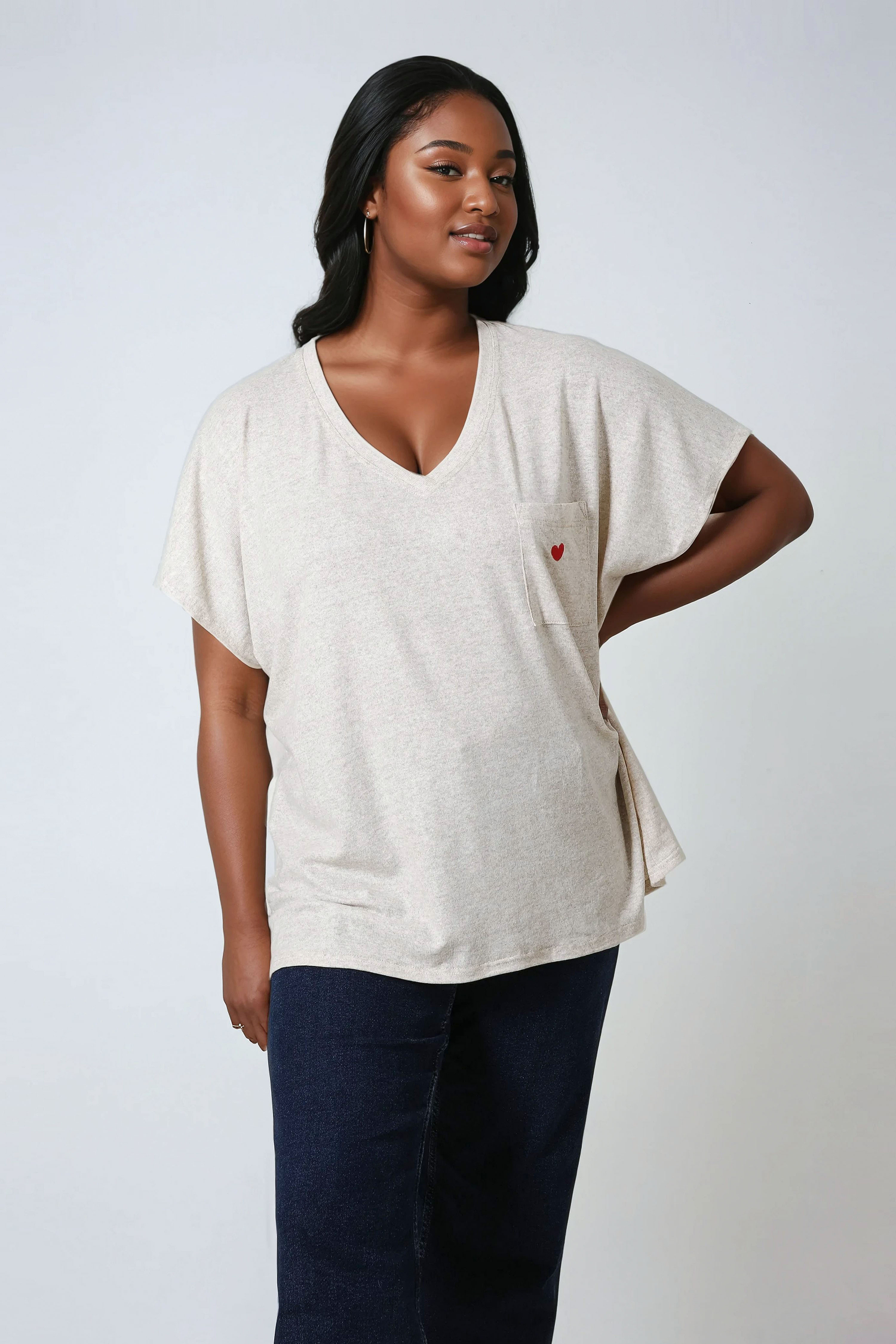 Heathered knit T-shirt with screen printing and embroidery.