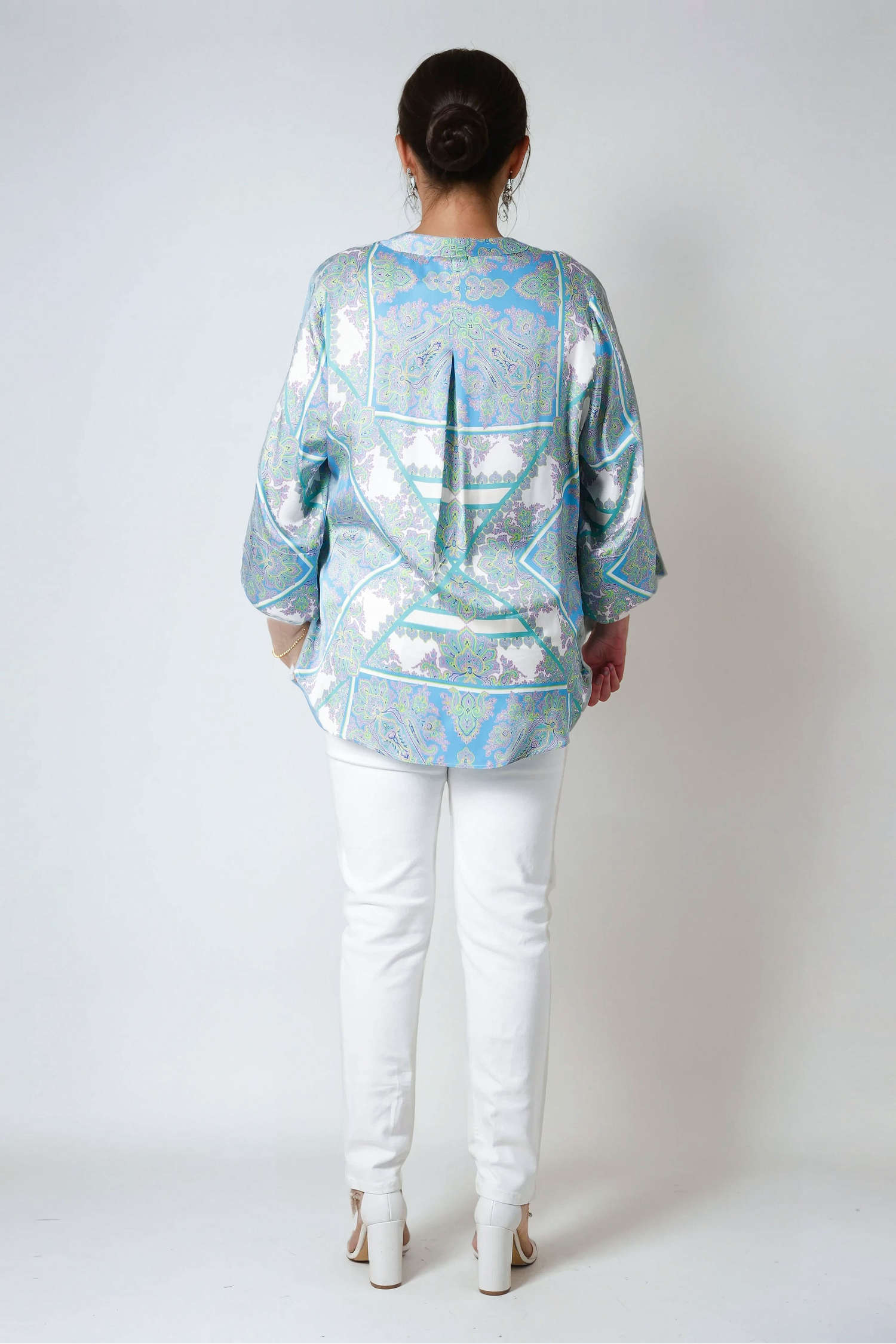 Printed blouse with a satin effect base.