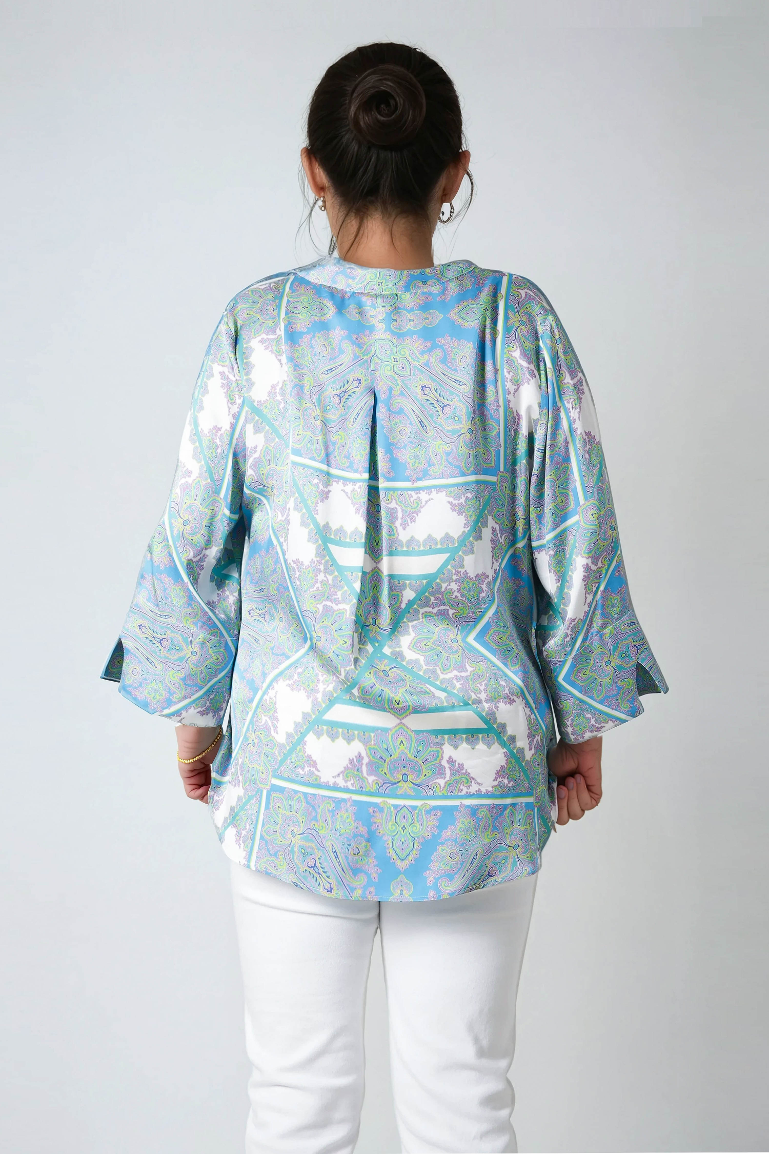 Printed blouse with a satin effect base.