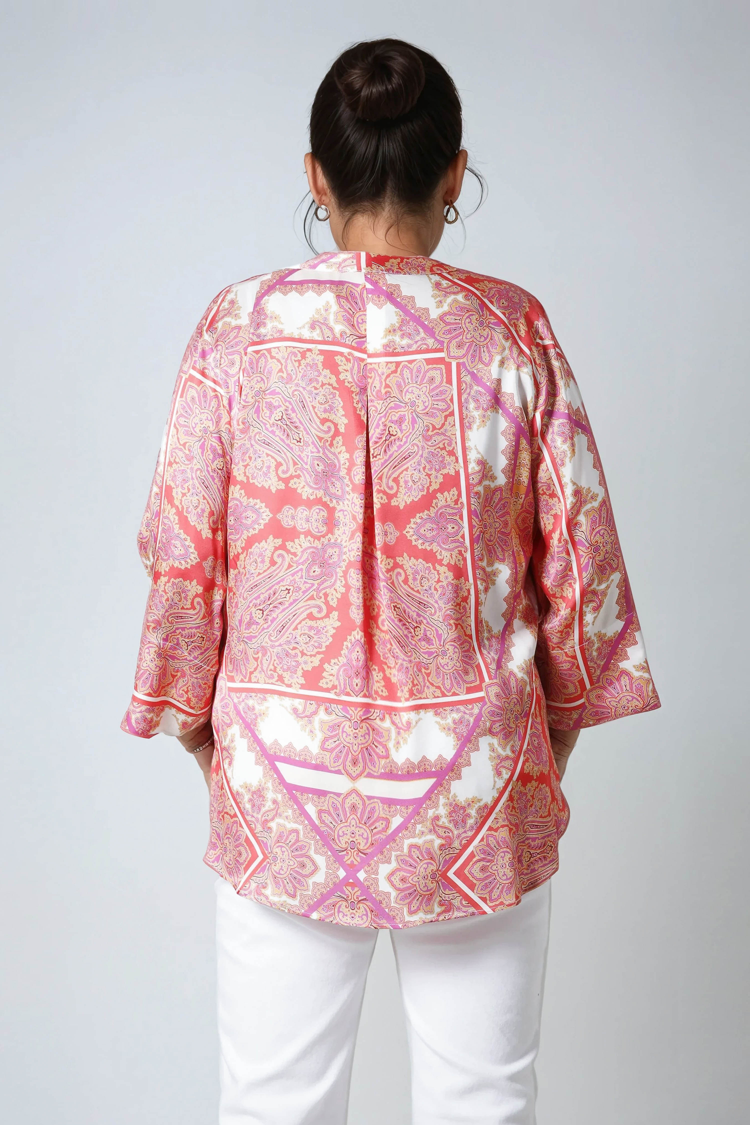 Printed blouse with a satin effect base.