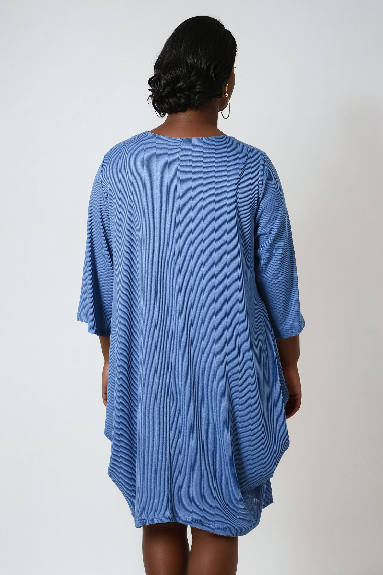 Plain knit tunic with V-neck and crisscross detailing