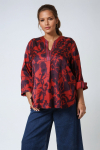 Printed blouse with a satin effect base.