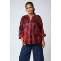 Printed blouse with a satin effect base.