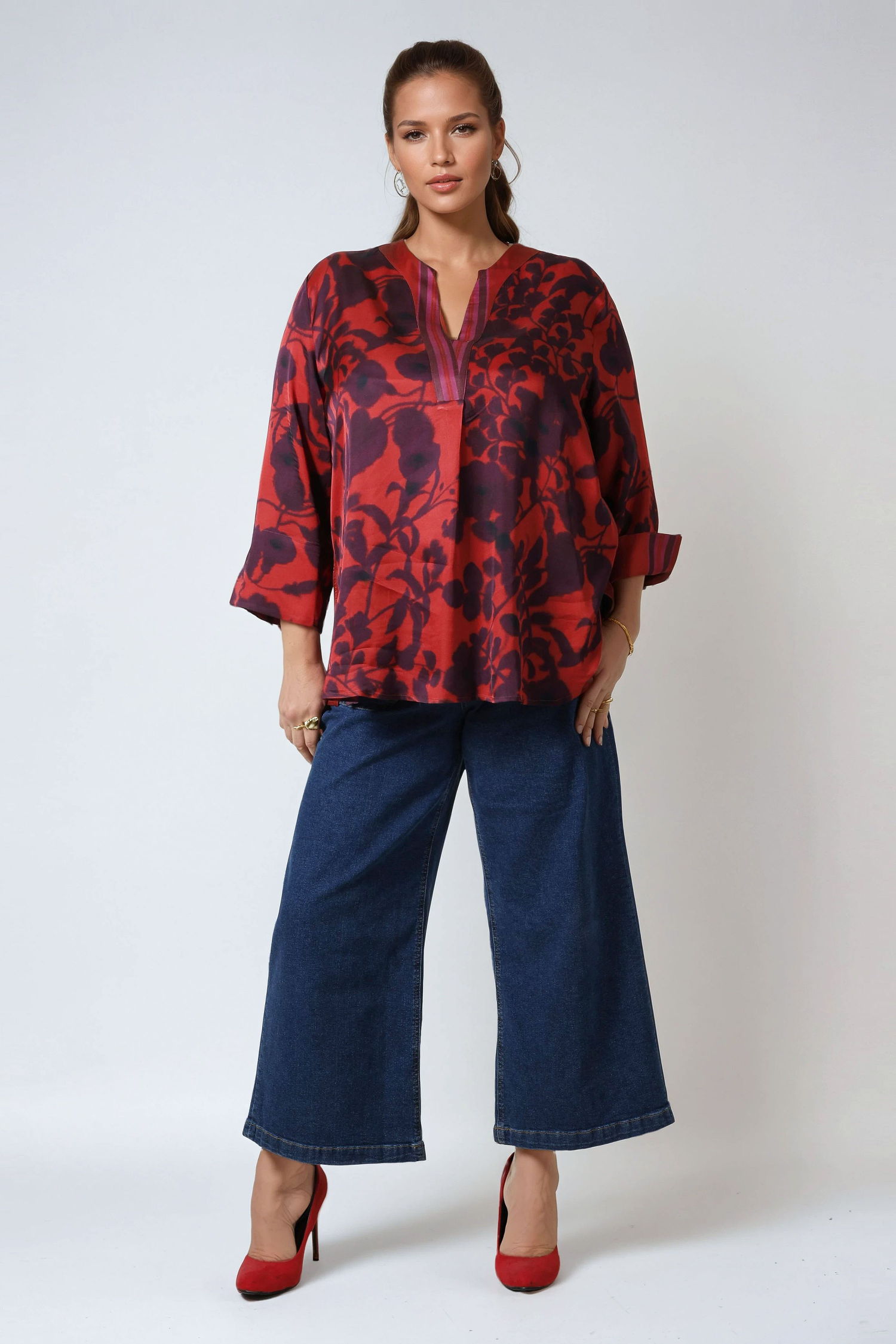Printed blouse with a satin effect base.