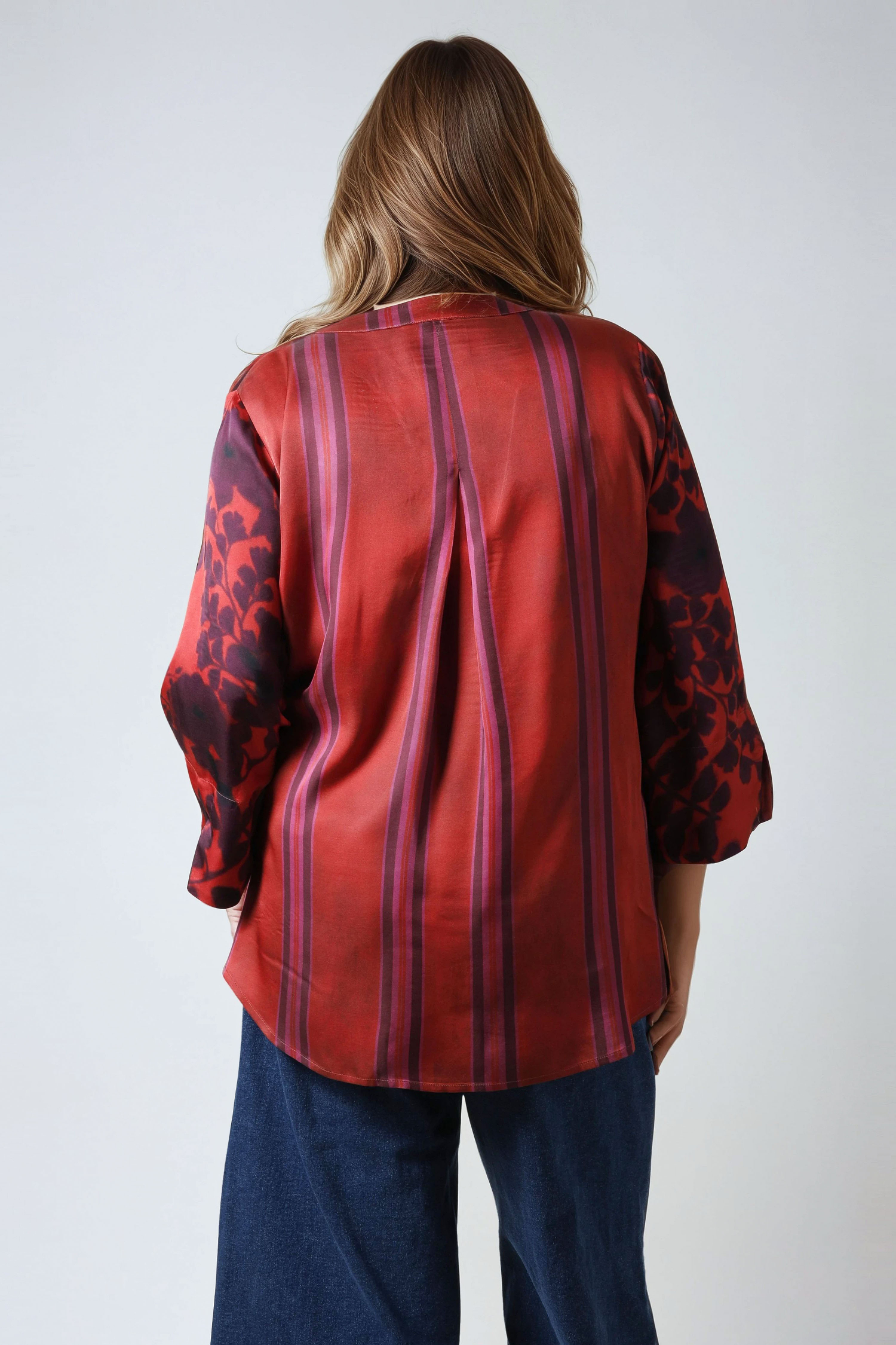 Printed blouse with a satin effect base.